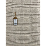 Featuring Tokaree Rowena Rug by Jaipur Living at Amethyst Home. Reminiscent of a basketweave, The Tokaree Rowena demonstrates sophistication and simplicity in a tonal taupe checker pattern.  Handwoven of 100% wool, varied pile height creates a unique texture and luxurious depth while maintaining durability and quality that are synonymous with our artisans.  Amethyst Home provides interior design, new home construction design consulting, vintage area rugs, and lighting in the Scottsdale metro area.