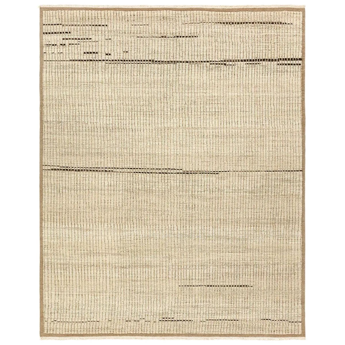 Full of texture, the handknotted Kazben Andar stuns with modern Moroccan patterns in natural hues. The Andar design delights with a taupe, tan, and brown linear pattern. A thin border adds the finishing touches to this elevated accent piece. Low, ribbed pile creates visual intrigue and grounds any contemporary space. Amethyst Home provides interior design, new home construction design consulting, vintage area rugs, and lighting in the Des Moines metro area.