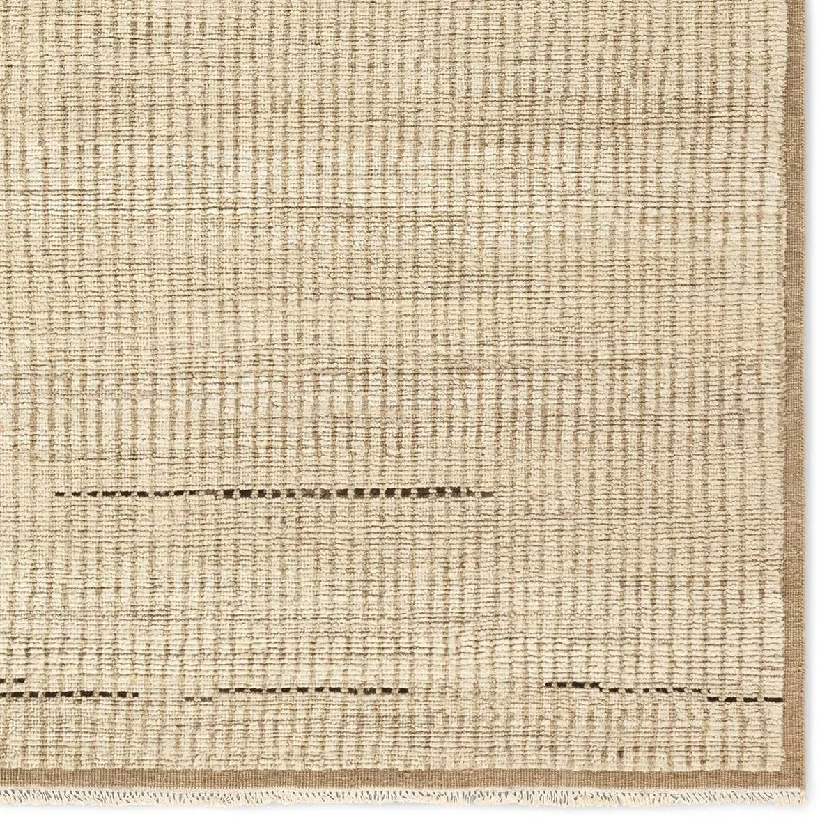 Full of texture, the handknotted Kazben Andar stuns with modern Moroccan patterns in natural hues. The Andar design delights with a taupe, tan, and brown linear pattern. A thin border adds the finishing touches to this elevated accent piece. Low, ribbed pile creates visual intrigue and grounds any contemporary space. Amethyst Home provides interior design, new home construction design consulting, vintage area rugs, and lighting in the Houston metro area.