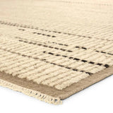 Full of texture, the handknotted Kazben Andar stuns with modern Moroccan patterns in natural hues. The Andar design delights with a taupe, tan, and brown linear pattern. A thin border adds the finishing touches to this elevated accent piece. Low, ribbed pile creates visual intrigue and grounds any contemporary space. Amethyst Home provides interior design, new home construction design consulting, vintage area rugs, and lighting in the Los Angeles metro area.