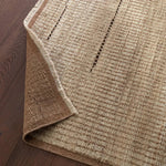 Full of texture, the handknotted Kazben Andar stuns with modern Moroccan patterns in natural hues. The Andar design delights with a taupe, tan, and brown linear pattern. A thin border adds the finishing touches to this elevated accent piece. Low, ribbed pile creates visual intrigue and grounds any contemporary space. Amethyst Home provides interior design, new home construction design consulting, vintage area rugs, and lighting in the Salt Lake City metro area.