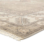 Featuring Apollo Famille Hand-Knotted Rug by Jaipur Living at Amethyst Home. An updated take on traditional design, the Apollo Famille is hand knotted of 100% wool by artisans in India for a luxurious, high-quality design.  The Famillie design features two classic medallions adorned with Elibelinde motifs with a distinct border honoring the Garden of Eden.. Amethyst Home provides interior design, new home construction design consulting, vintage area rugs, and lighting in the Scottsdale metro area.