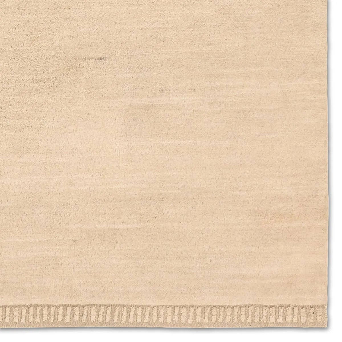 Featuring Colson Hand-Knotted Rug by Jaipur Living at Amethyst Home. The Bekarys Colson features a shaggy texture with a remarkably soft pile that invites relaxation and warmth. Its solid neutral tones provide a versatile backdrop that enhances any decor. This plush, hand-knotted gem offers both tactile pleasure and visual appeal.Hand Knotted100% WoolBKR. Amethyst Home provides interior design, new home construction design consulting, vintage area rugs, and lighting in the Laguna Beach metro area.