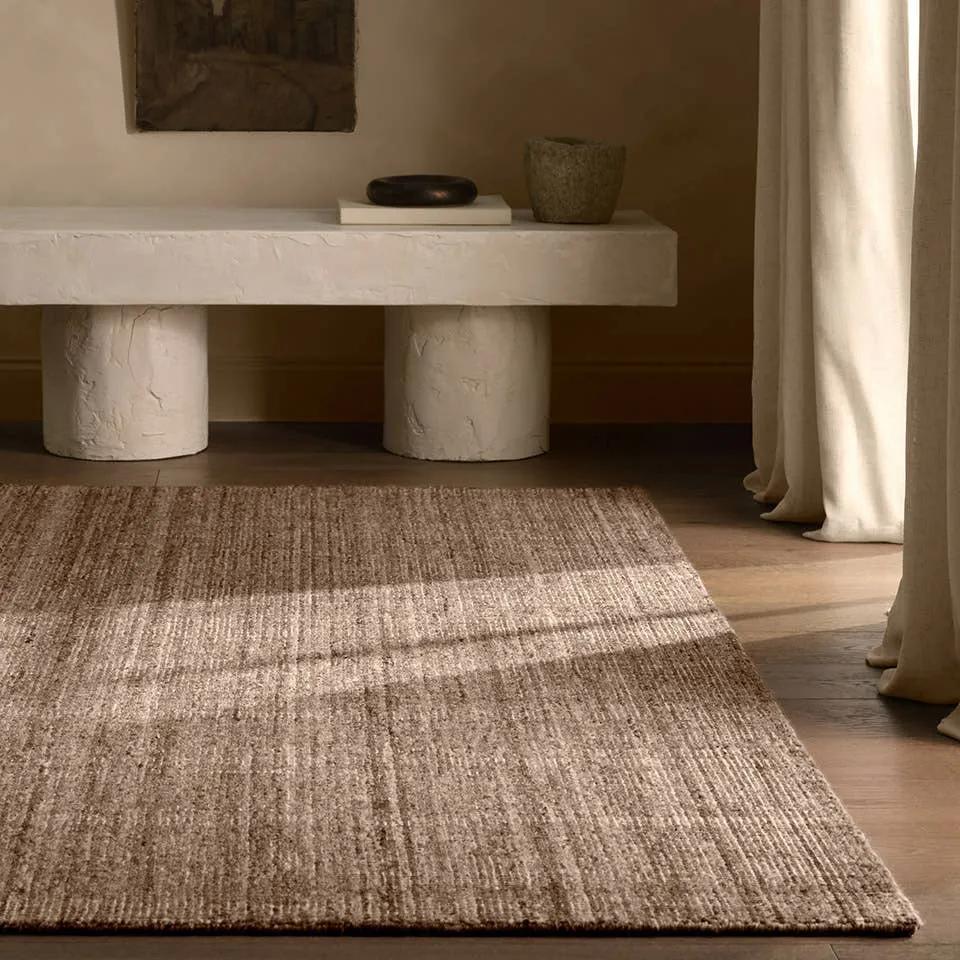 Featuring Hued Rug by Jaipur Living at Amethyst Home. Subtle variations of brown create depth and dimension in the elegantly understated Hue rug. Handwoven with precision, its solid design offers a timeless foundation for any space—from modern to classic interiors.Handwoven60% Wool 40% CottonSLO03 Solon HuedBlot stains immediately and clean with a mild soap. Amethyst Home provides interior design, new home construction design consulting, vintage area rugs, and lighting in the Charlotte metro area.