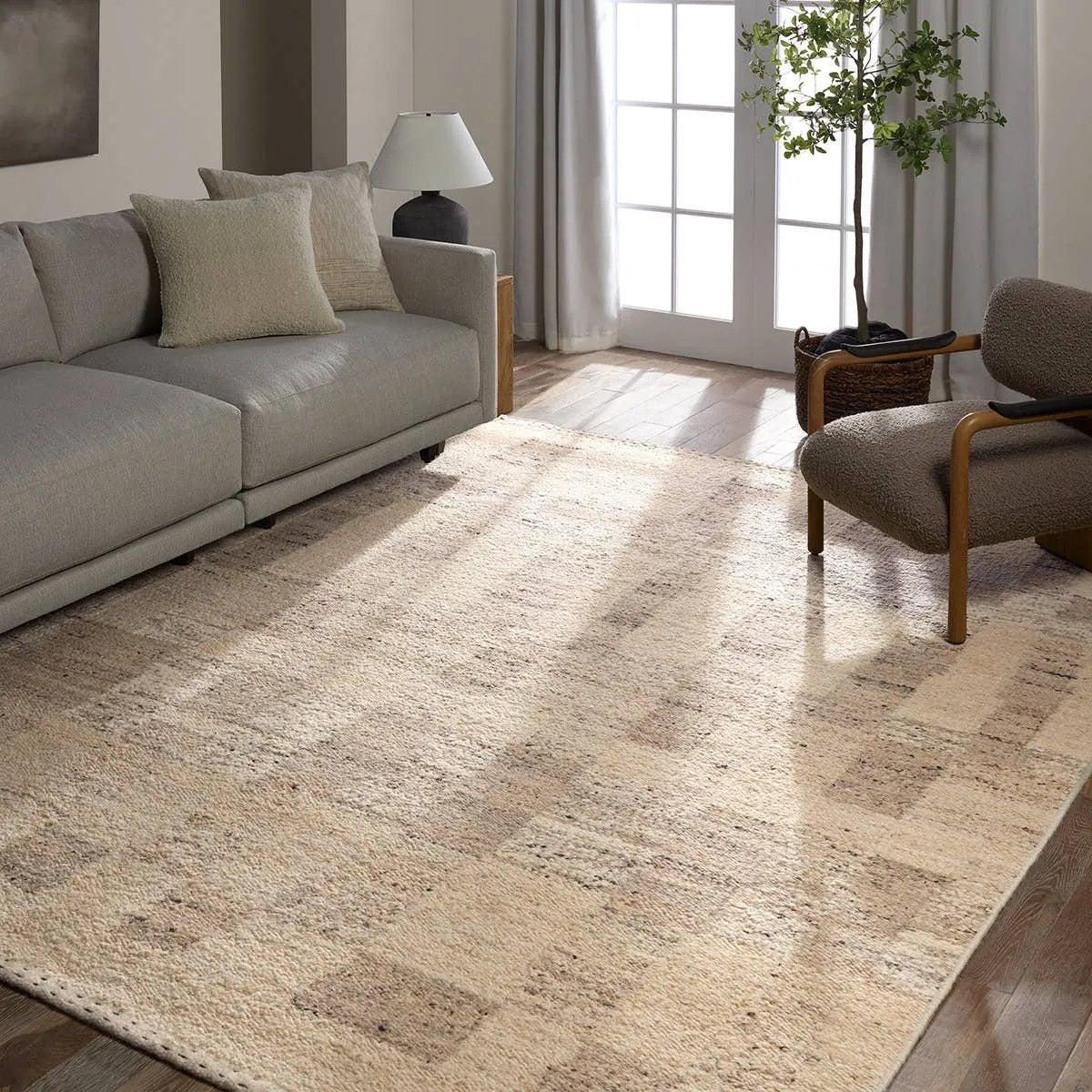 Featuring Leona Llara Rug by Jaipur Living at Amethyst Home. With its lofty, handmade loops, the Llara rug is an inviting, textural essential. Crafted of 100% undyed wool, its natural, relaxed, persona is met with an open pattern of Moroccan stripes. An outstanding union of artistry and contemporary style, its physical approachability, monochromatic palette. Amethyst Home provides interior design, new home construction design consulting, vintage area rugs, and lighting in the San Diego metro area.