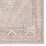 Distressed, vintage designs offer an elevated tone for the Lumal Collection. The Orame rug features a Southwestern-inspired medallion, geometric border, and intricate detailing in tones of mauve, light blue, brown, and cream. This machine washable rug is stain resistant and easy to clean, perfect for homes with children and pets. Amethyst Home provides interior design, new home construction design consulting, vintage area rugs, and lighting in the Omaha metro area.