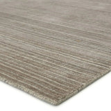 Featuring Second Sunset  Gradient Rug by Jaipur Living at Amethyst Home. The easy-to-decorate, earthy tones of the Second Sunset Gradient prove that simplicity can sometimes be striking. The Gradient rug is hand loomed of durable wool and jasmine for a sumptuous and inviting hand. The variation in the cool brown, gray, and light taupe tones of this lustrous. Amethyst Home provides interior design, new home construction design consulting, vintage area rugs, and lighting in the Charlotte metro area.