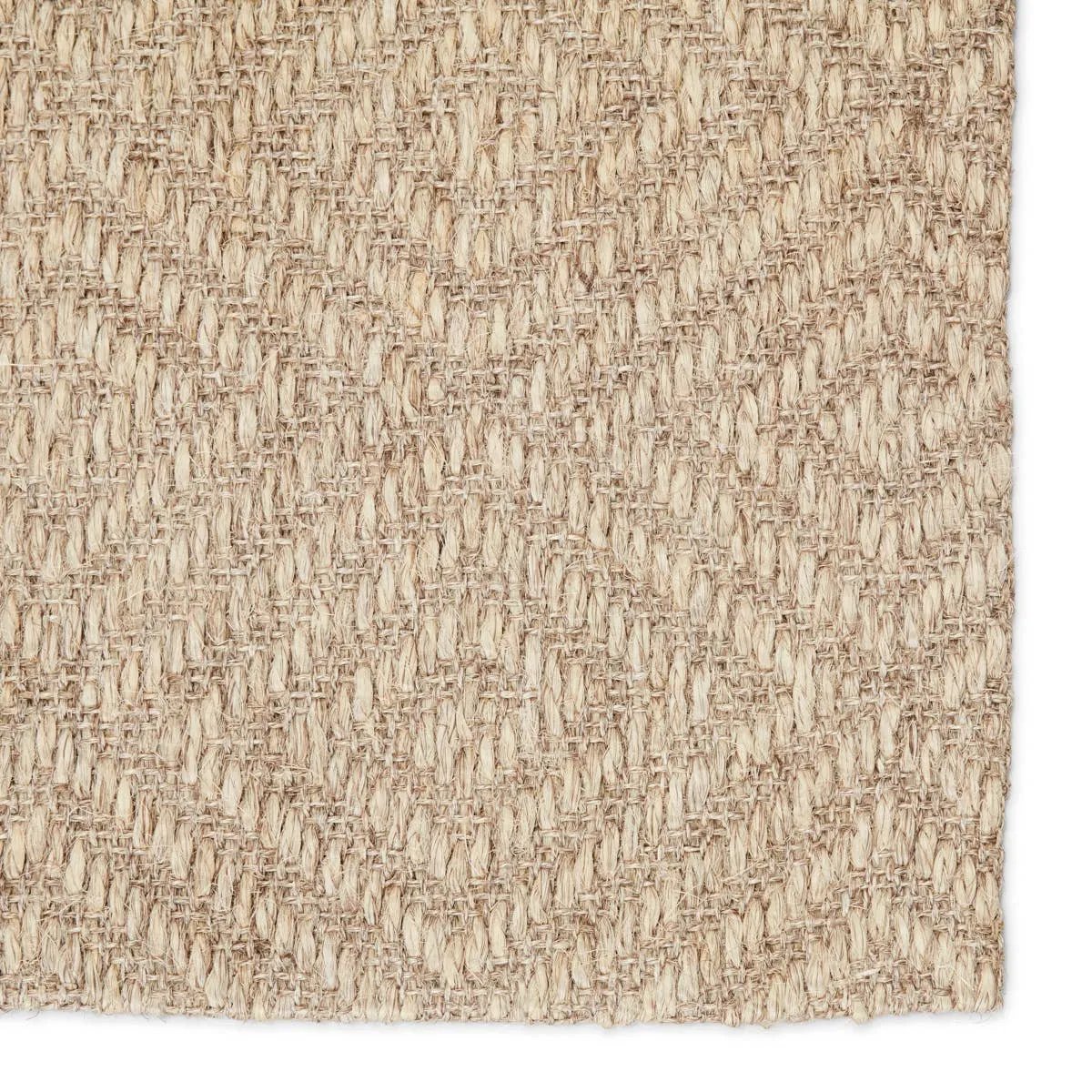 This sisal area rug boasts natural charm and effortless casual style. In a light gray hue, this natural accent's diamond lattice weave creates unique geometric dimension Amethyst Home provides interior design, new home construction design consulting, vintage area rugs, and lighting in the Nashville metro area.