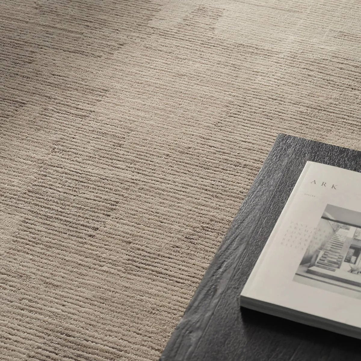 Featuring Tenley Rug by Jaipur Living at Amethyst Home. The hand-tufted Labyrinth Tenley presents abstract designs crafted from plush wool with a cut and looped pile, creating a rich, tactile texture. The Tenley design showcases a bold, geometric pattern with a modern brutalist influence in shades of gray and taupe, effortlessly adding depth and sophisticat. Amethyst Home provides interior design, new home construction design consulting, vintage area rugs, and lighting in the Calabasas metro area.