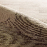 Featuring Tenley Rug by Jaipur Living at Amethyst Home. The hand-tufted Labyrinth Tenley presents abstract designs crafted from plush wool with a cut and looped pile, creating a rich, tactile texture. The Tenley design showcases a bold, geometric pattern with a modern brutalist influence in shades of gray and taupe, effortlessly adding depth and sophist. Amethyst Home provides interior design, new home construction design consulting, vintage area rugs, and lighting in the Newport Beach metro area.