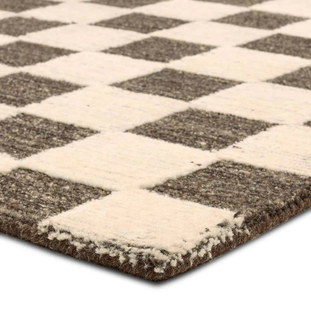 Featuring Tijara Rug by Jaipur Living at Amethyst Home. The Tijara design checks all the boxes. Handmade of 100% all-natural, undyed wool, this rug enjoys an understated elegance that is satisfying in its simplicity. Intricate overtufting brings a dynamic high-low pile to life, adding dimension. Easy to care for, durable, and undoubtedly modern, it exudes a qui. Amethyst Home provides interior design, new home construction design consulting, vintage area rugs, and lighting in the Omaha metro area.