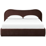 Subtly curved, this swooping bed frame is fully upholstered in a soft, plum-hue fabric for an inviting look that's rich in comfort Amethyst Home provides interior design, new home construction design consulting, vintage area rugs, and lighting in the Dallas metro area.