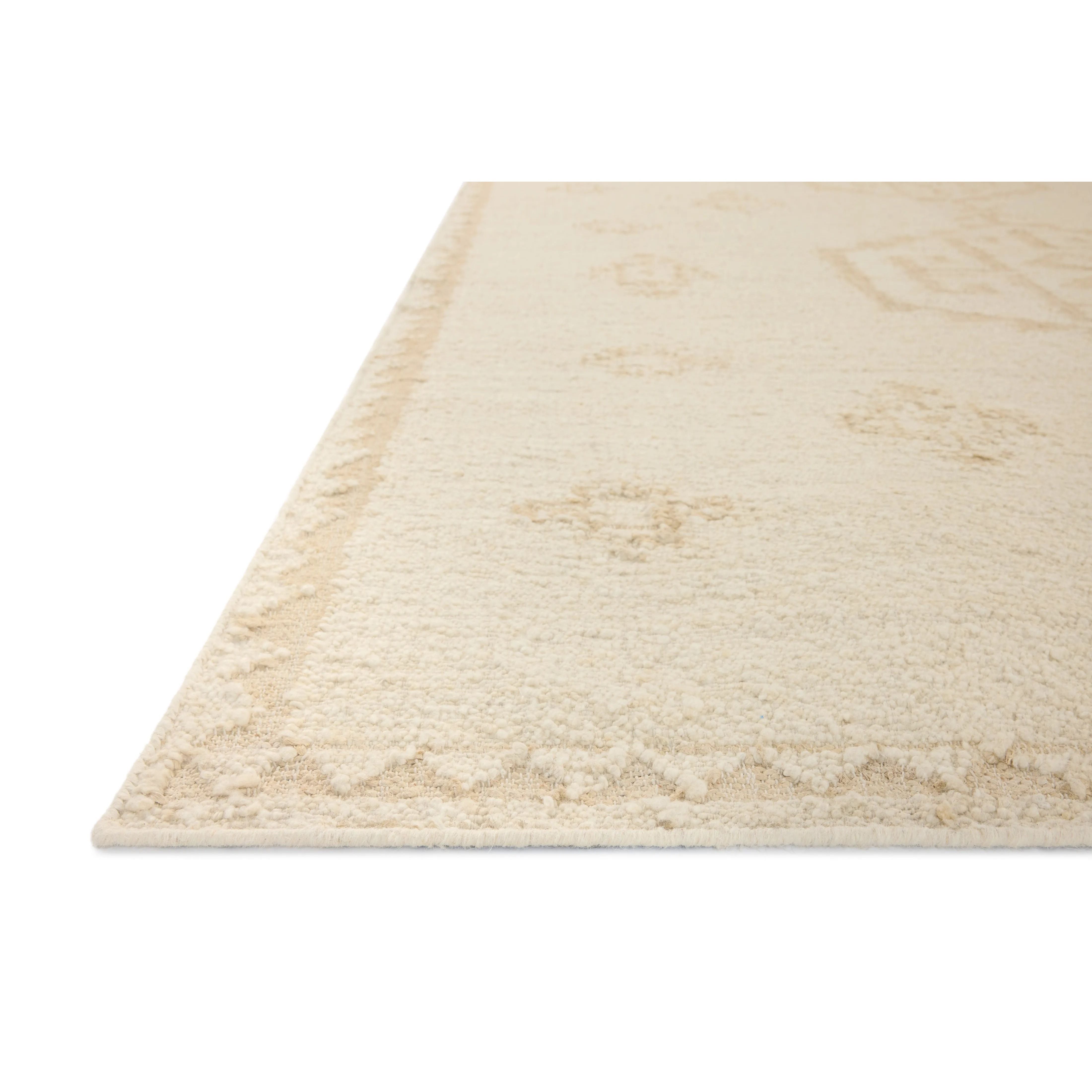 The Alara Collection is a unique and refined area rug that combines finely spun jute with chunky wool for dynamic pile juxtaposition. A neutral ivory palette with natural color variation makes it an elegant addition to home decor in living rooms, bedrooms, and more. Amethyst Home provides interior design, new home construction design consulting, vintage area rugs, and lighting in the Monterey metro area.