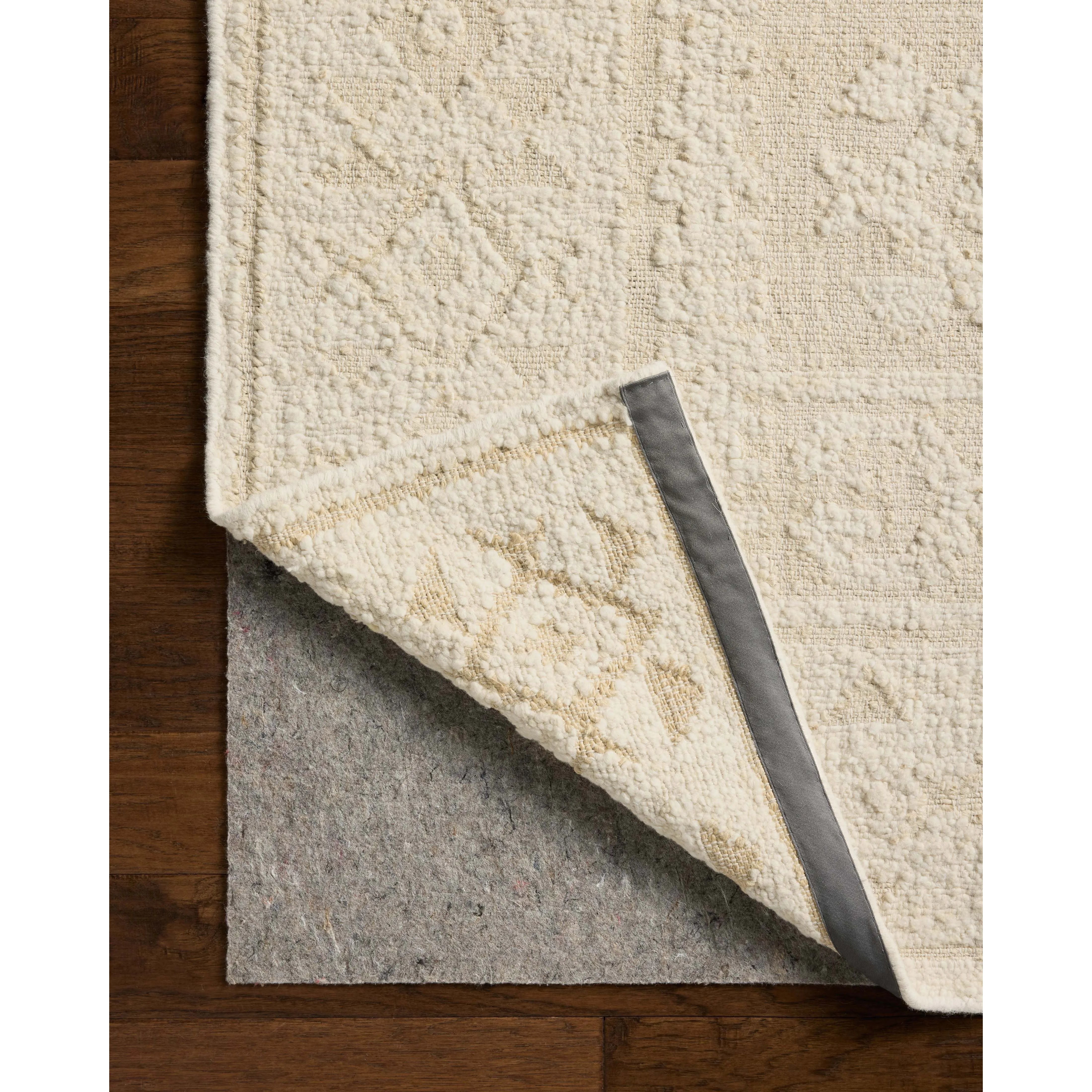 The Alara Collection is a unique and refined area rug that combines finely spun jute with chunky wool for dynamic pile juxtaposition. A neutral ivory palette with natural color variation makes it an elegant addition to home decor in living rooms, bedrooms, and more. Amethyst Home provides interior design, new home construction design consulting, vintage area rugs, and lighting in the Winter Garden metro area.