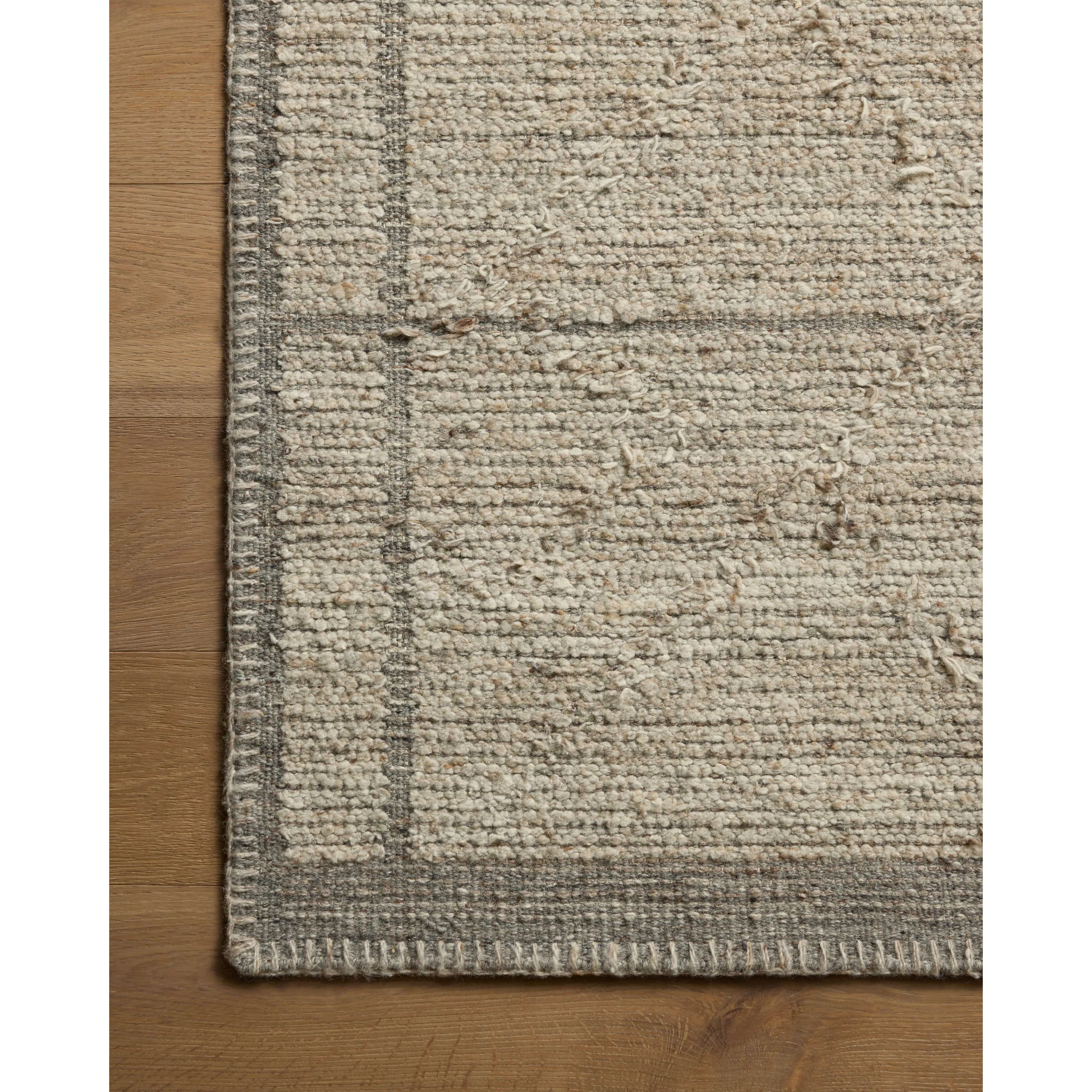 Beautifully crafted by hand, the Bowie Collection by Amber Lewis x Loloi is a textured area rug with an earthy, organic aesthetic. The pile has a flatweave base with chunkier, slightly raised geometric motifs and whipstitched edges. It’s an elegant yet easy-to-work-with rug for living rooms, bedrooms, and other high-traffic areas of the home. Amethyst Home provides interior design, new home construction design consulting, vintage area rugs, and lighting in the Laguna Beach metro area.