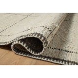 Beautifully crafted by hand, the Bowie Collection by Amber Lewis x Loloi is a textured area rug with an earthy, organic aesthetic. The pile has a flatweave base with chunkier, slightly raised geometric motifs and whipstitched edges. It’s an elegant yet easy-to-work-with rug for living rooms, bedrooms, and other high-traffic areas of the home. Amethyst Home provides interior design, new home construction design consulting, vintage area rugs, and lighting in the Monterey metro area.