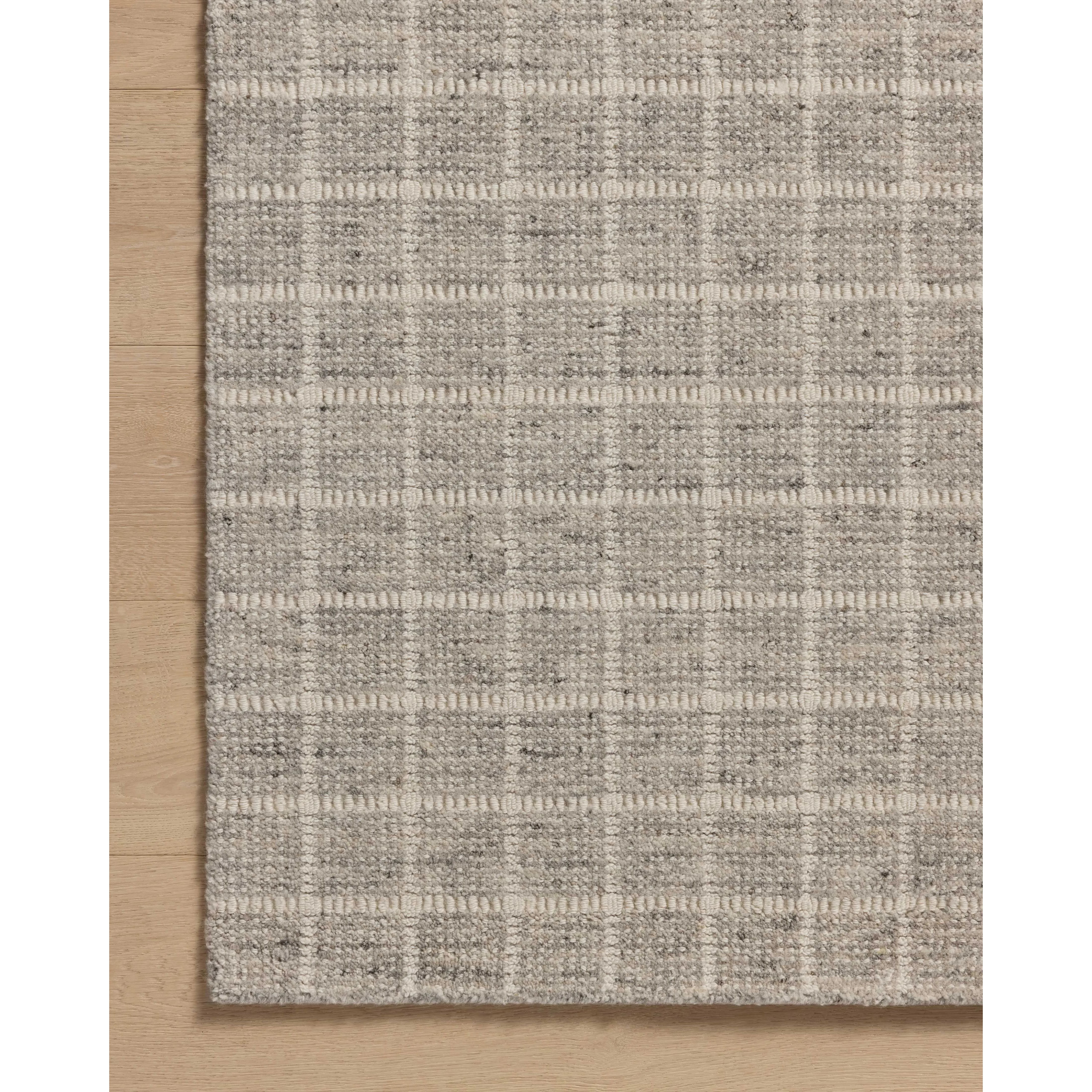 Featuring Amber Lewis x Loloi Cedar Grey / Ivory Rug by Loloi at Amethyst Home. The Cedar Collection by Amber Lewis x Loloi is a hand-loomed area rug with a clean gridded design in contrasting ivory. The rugs blended wool and cotton pile is substantial and soft, with flecked tones that add depth to the neutral palette. This collection is hand-loomed of . Amethyst Home provides interior design, new home construction design consulting, vintage area rugs, and lighting in the Newport Beach metro area.