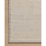 Featuring Amber Lewis x Loloi Dakota Mist / Ivory Rug by Loloi at Amethyst Home. The Dakota Collection by Amber Lewis x Loloi is a flatweave-style area rug with a muted checkerboard pattern framed with a deeper-toned border. The rug is hand-woven of wool and cotton for a durable, natural warmth in living rooms, bedrooms, and more. This collection is handmad. Amethyst Home provides interior design, new home construction design consulting, vintage area rugs, and lighting in the San Diego metro area.