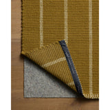 The Harlan Collection by Amber Lewis x Loloi is a classic striped flatweave area rug in the interior designer’s signature warm, earthy tones. The rug has a chunky wool pile with whipstitch borders that add character and natural texture to living rooms, bedrooms, and other well-loved areas of the home. Amethyst Home provides interior design, new home construction design consulting, vintage area rugs, and lighting in the Tampa metro area.