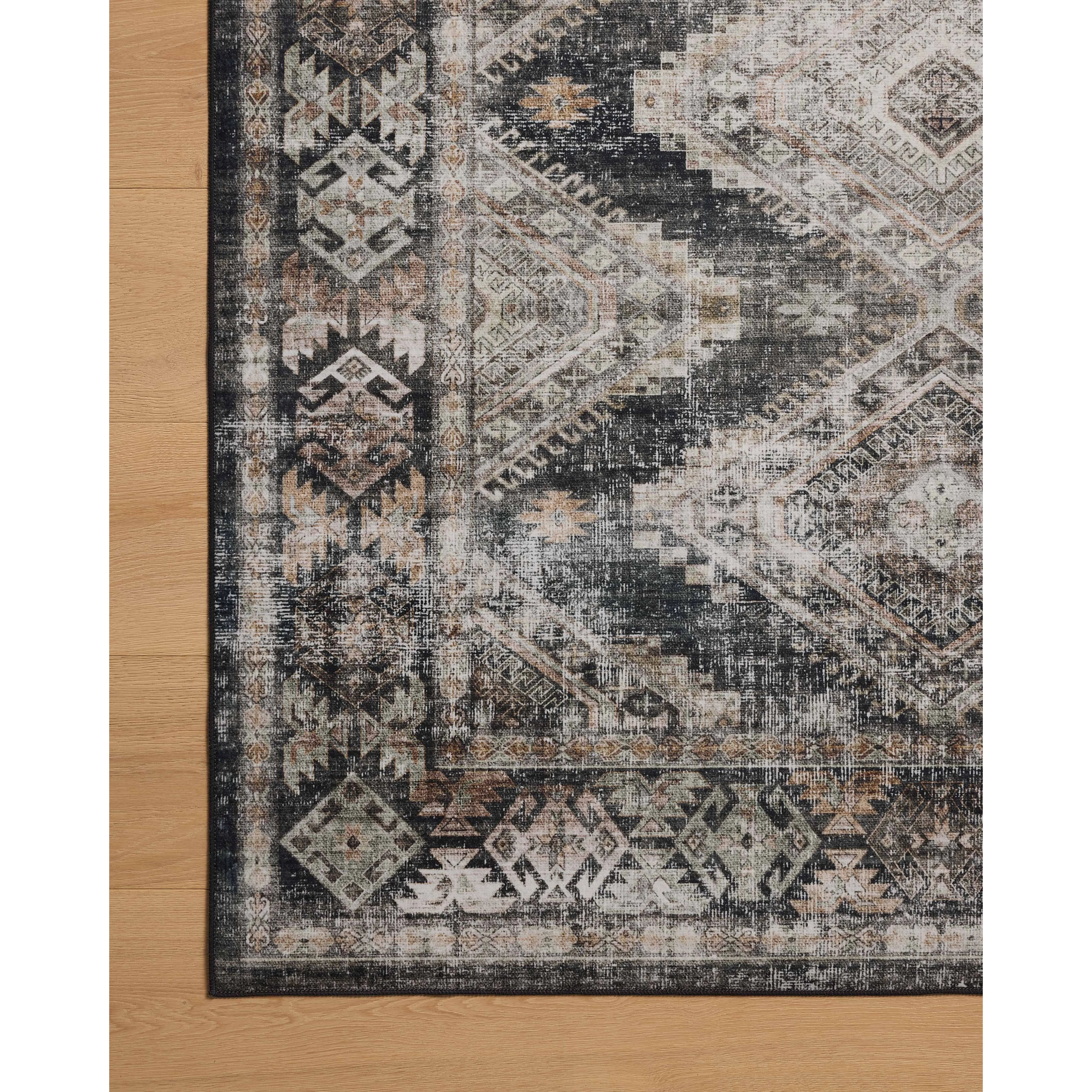 Featuring Amber Lewis x Loloi Josie Ink / Earth Rug by Loloi at Amethyst Home. The Josie Collection is a machine-washable area rug with an exceptional design by Amber Lewis x Loloi. The rugs beautiful, vintage-inspired motifs in rich, earthy tones raise the standard for washable rugs. This collection is power-loomed of polyester in China and OEKO-TEX certifie. Amethyst Home provides interior design, new home construction design consulting, vintage area rugs, and lighting in the Houston metro area.