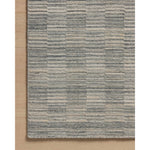 Featuring Amber Lewis x Loloi Marlowe Sky / Natural Rug by Loloi at Amethyst Home. The Marlowe Collection by Amber Lewis x Loloi is a handmade area rug with a coastal-inspired gridded design in natural color palettes. The rugs muted pattern adds understated depth with a durable, thick pile. This collection is hand-loomed of wool in India and Goodweave-certified. Amethyst Home provides interior design, new home construction design consulting, vintage area rugs, and lighting in the Miami metro area.