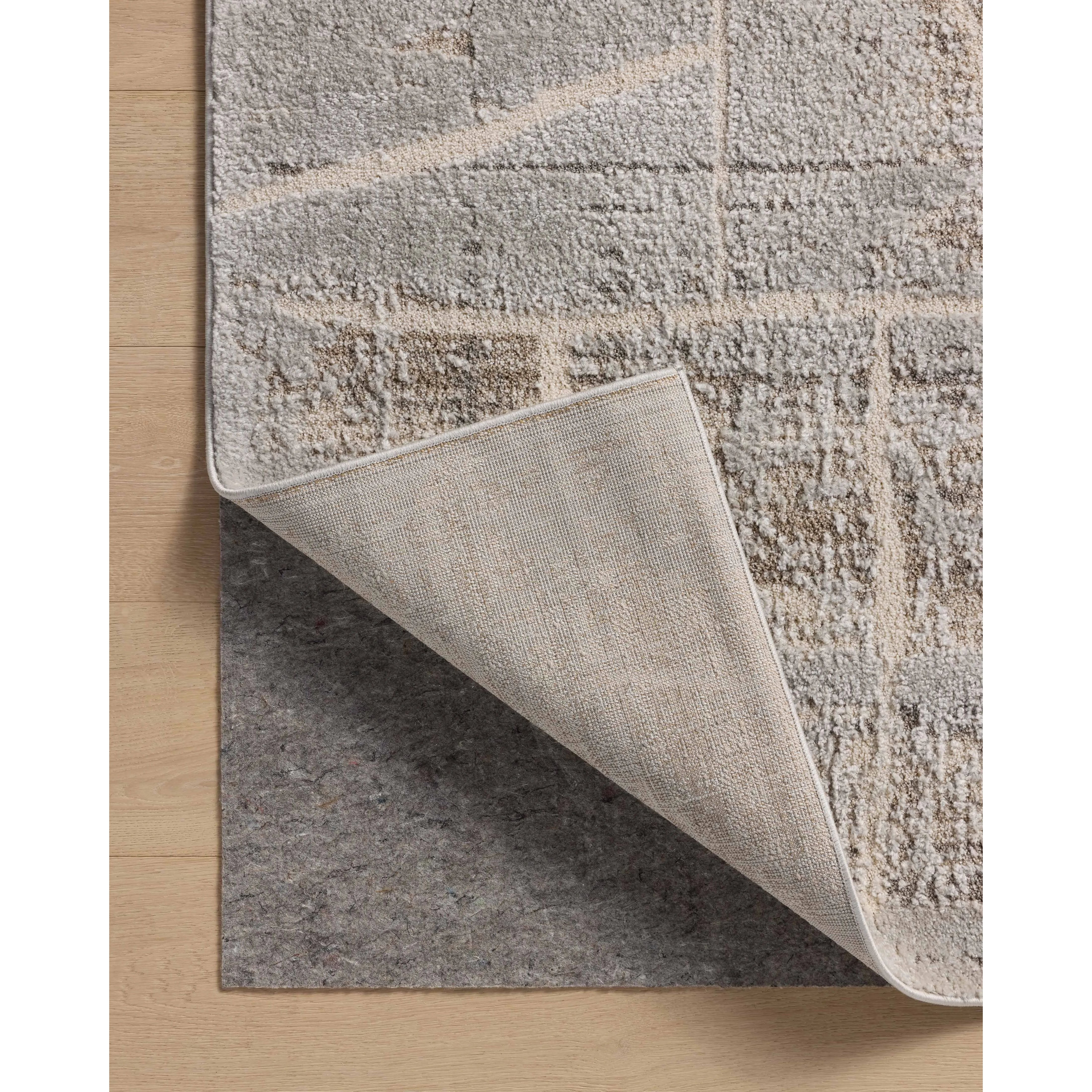 Featuring Amber Lewis x Loloi Monty Natural / Mist Rug by Loloi at Amethyst Home. The Monty Collection by Amber Lewis x Loloi is a modern interpretation of richly piled Moroccan rugs in a refreshingly neutral color palette. The rugs abstract designs create a high-low texture in the pile for feet to sink into. This collection is power-loomed of easy-to-clean po. Amethyst Home provides interior design, new home construction design consulting, vintage area rugs, and lighting in the Dallas metro area.