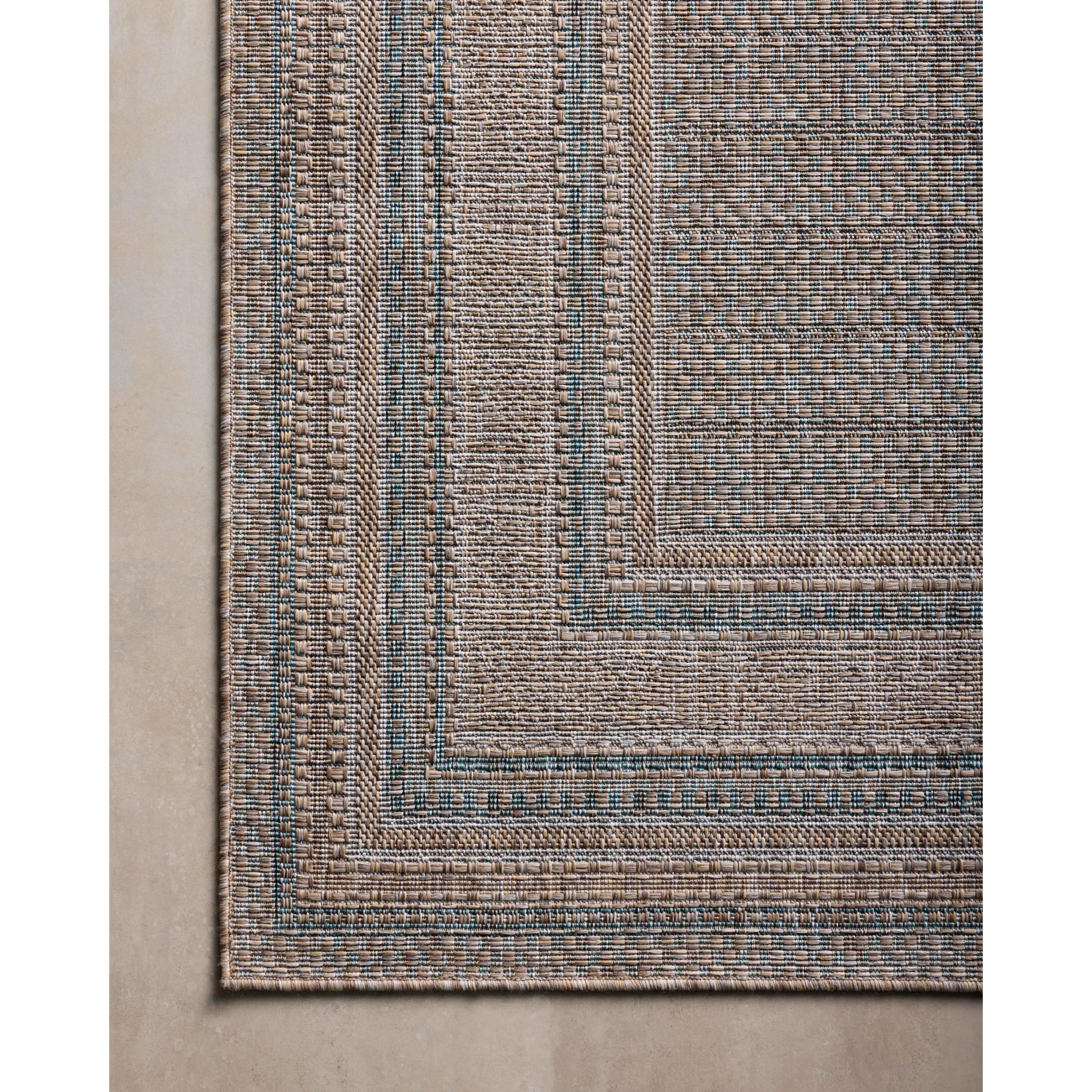 Featuring Amber Lewis x Loloi Topanga Natural / Teal Rug by Loloi at Amethyst Home. Inspired by the scenic mountain town in California, the Topanga Collection is an indoor/outdoor rug made of durable polypropylene that resembles natural fibers but is much more ready for sun, rain, and high-traffic use. The rug's modern construction also makes it easy to cl. Amethyst Home provides interior design, new home construction design consulting, vintage area rugs, and lighting in the Washington metro area.