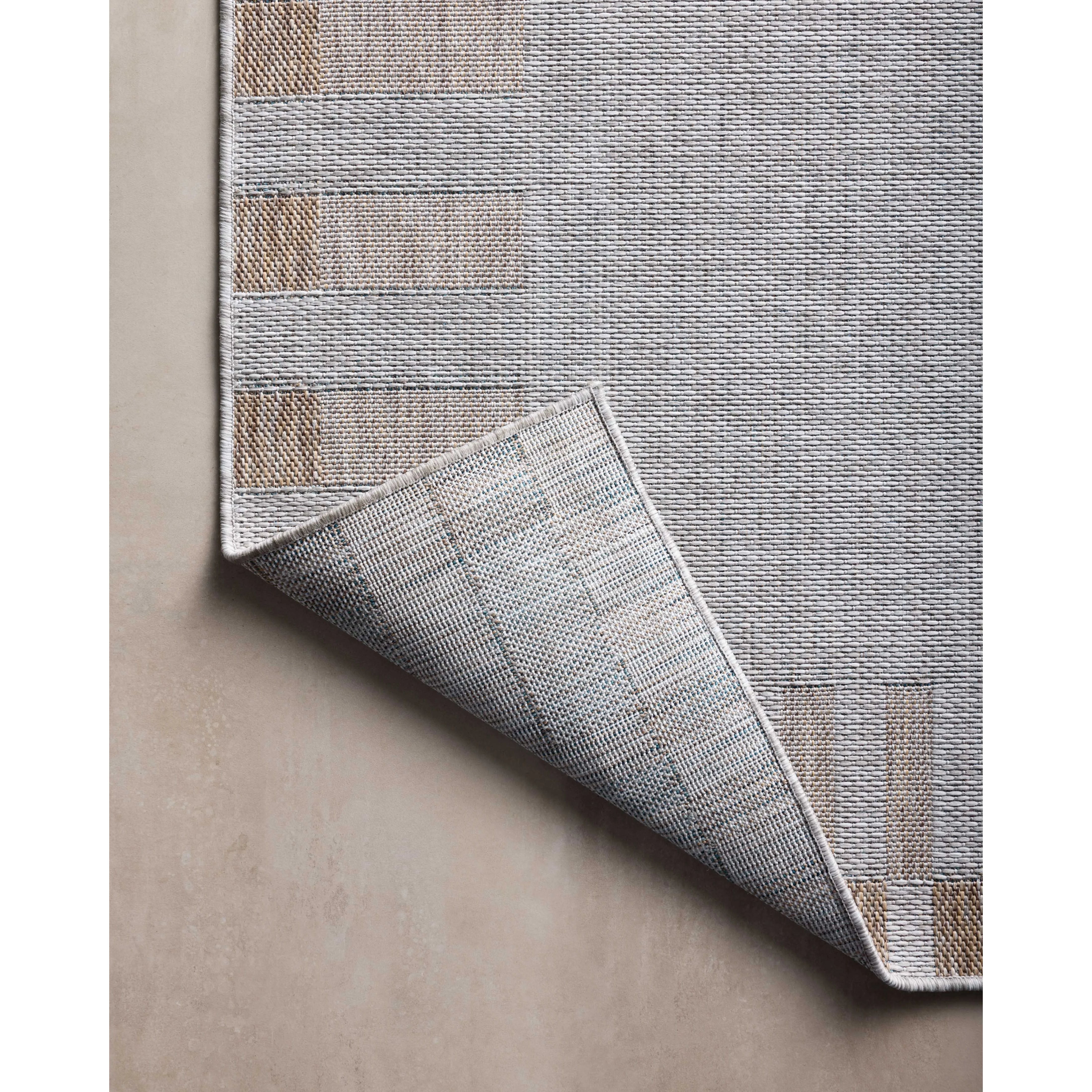 Featuring Amber Lewis x Loloi Topanga Silver / Natural Rug by Loloi at Amethyst Home. Inspired by the scenic mountain town in California, the Topanga Collection is an indoor/outdoor rug made of durable polypropylene that resembles natural fibers but is much more ready for sun, rain, and high-traffic use. The rug's modern construction also makes it easy to clea. Amethyst Home provides interior design, new home construction design consulting, vintage area rugs, and lighting in the Austin metro area.