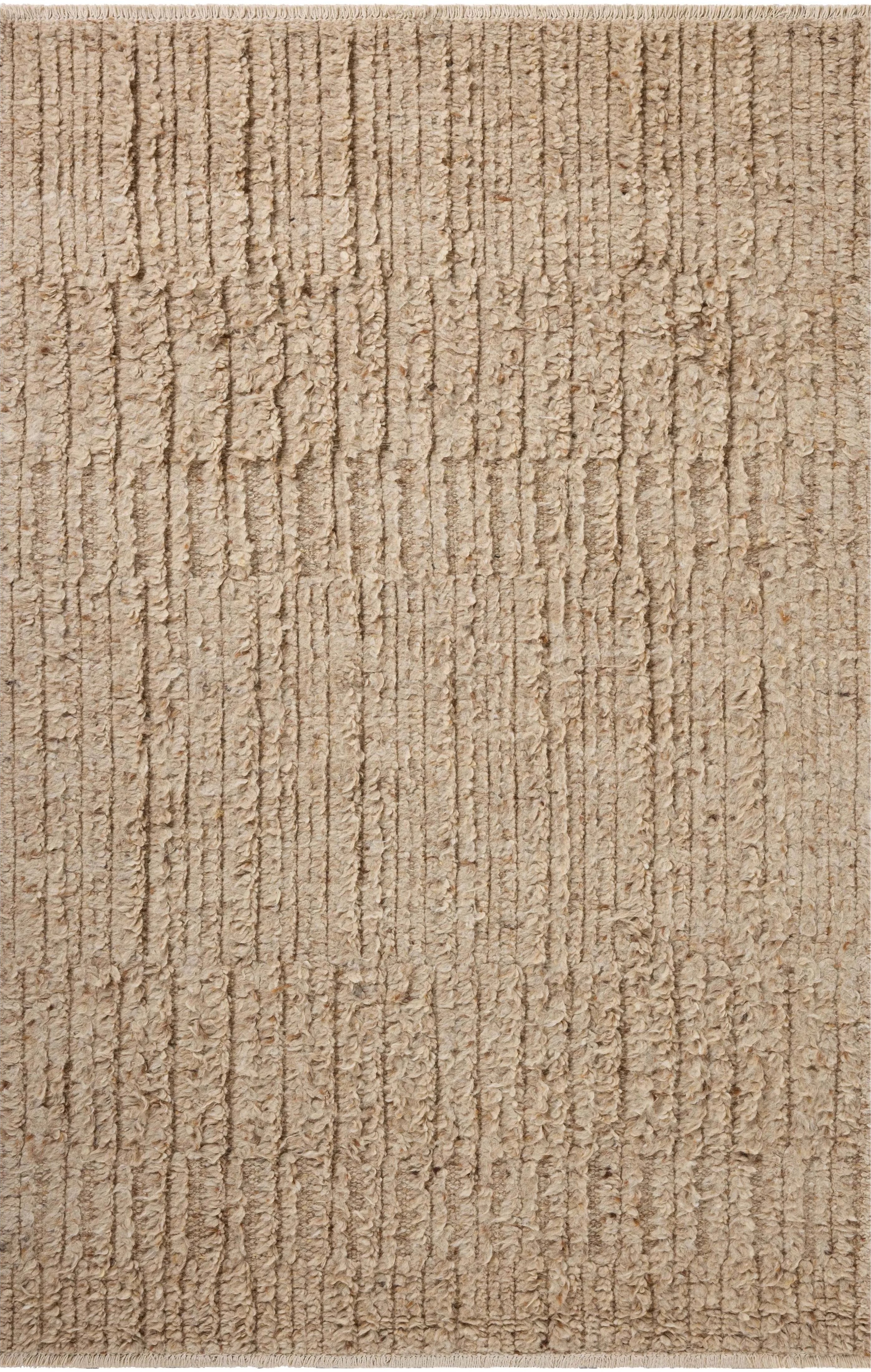Irresistible to walk upon, the Dana Sand Rug by Brigette Romanek x Loloi has a high-low texture that alternates between a subtly shaggy pile and a soft base. Horizontal broken stripes give the area rug a fresh and energized structure, while a finish of fringe along the edges accentuates its sense of movement. Amethyst Home provides interior design, new home construction design consulting, vintage area rugs, and lighting in the Portland metro area.