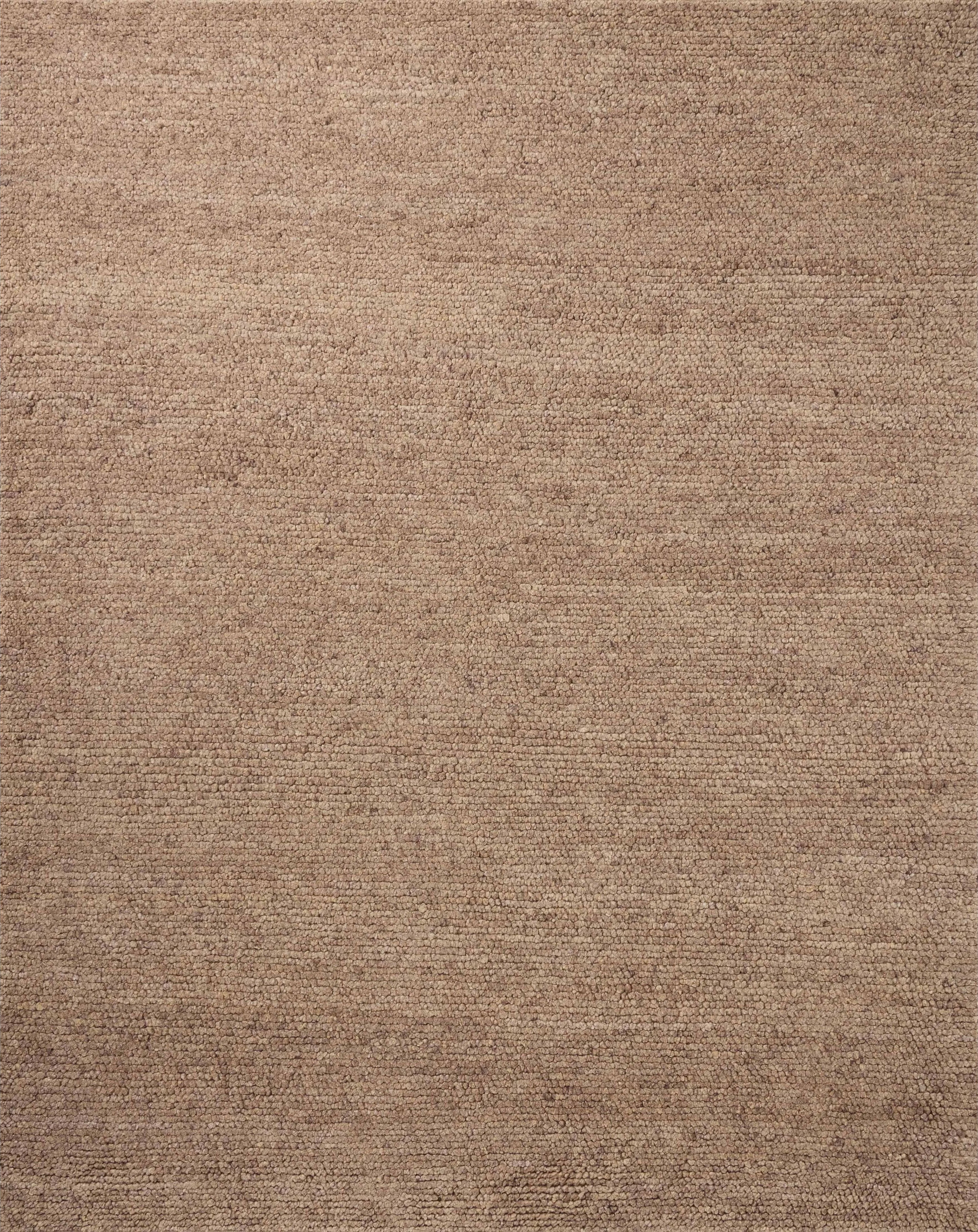 With versatile earth tones and a chunky, hand-knotted texture resembling tiny pebbles, the Frida Dark Taupe Rug by Brigette Romanek x Loloi can ground any room with a sense of elevated ease. Each area rug features a subtle nuance in color variation due to the handmade nature of its construction and has a pleasantly nubby softness underfoot. Amethyst Home provides interior design, new home construction design consulting, vintage area rugs, and lighting in the Nashville metro area.