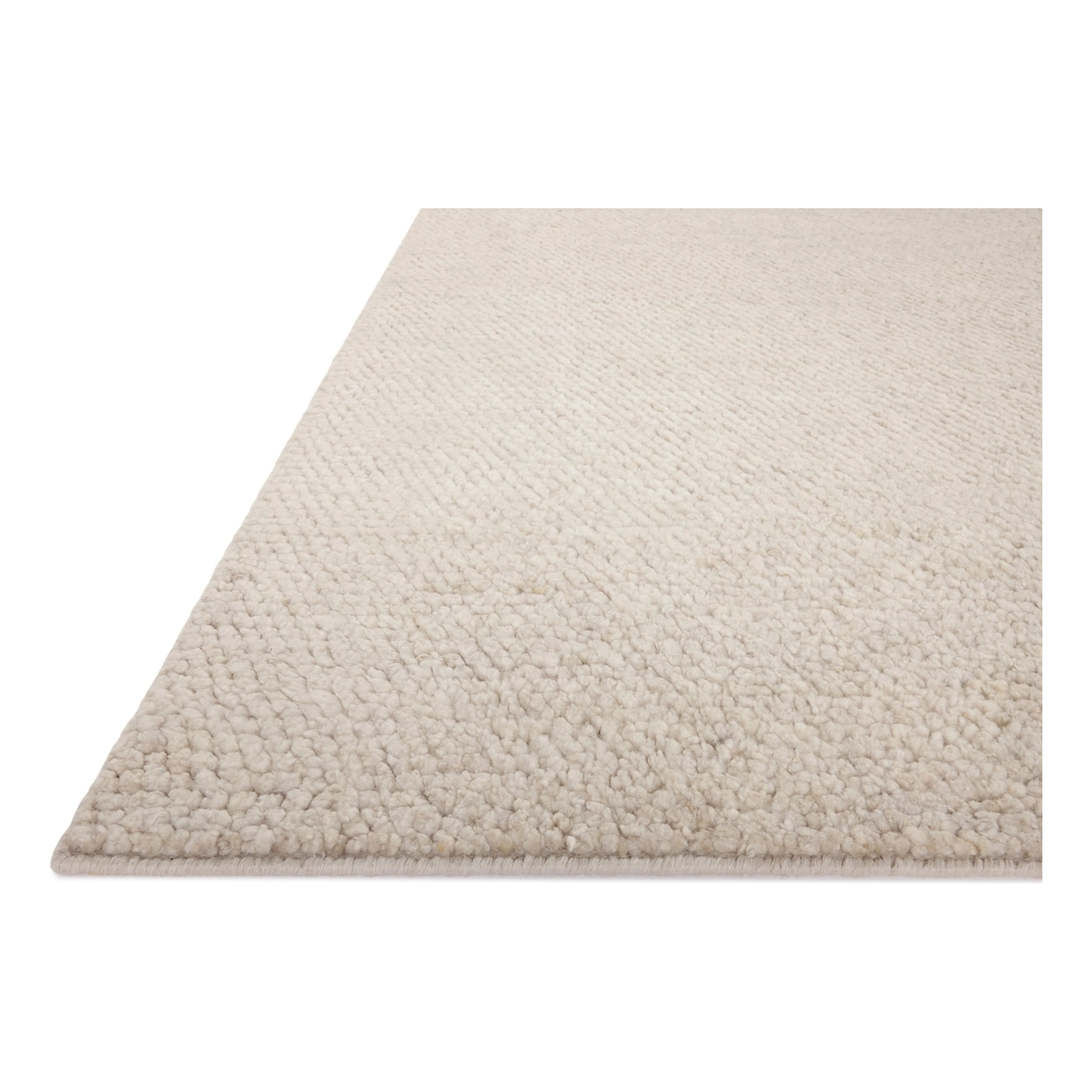 Featuring Brigette Romanek x Loloi Frida Silver Hand-Knotted Rug by Loloi at Amethyst Home. With versatile earth tones and a chunky, hand-knotted texture resembling tiny pebbles, the Frida Silver Rug by Brigette Romanek x Loloi can ground any room with a sense of elevated ease. Each area rug features a subtle nuance in color variation due to the handmade natur. Amethyst Home provides interior design, new home construction design consulting, vintage area rugs, and lighting in the Boston metro area.