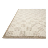 The Knox Ivory / Khaki Rug by Brigette Romanek x Loloi is a handwoven area rug with a contemporary checkerboard pattern and a texture reminiscent of a luxurious knit sweater. Made of a blend of wool and cotton that plays with scale and texture, Knox is imbued with cozy luxury that can anchor any room. Amethyst Home provides interior design, new home construction design consulting, vintage area rugs, and lighting in the Miami metro area.