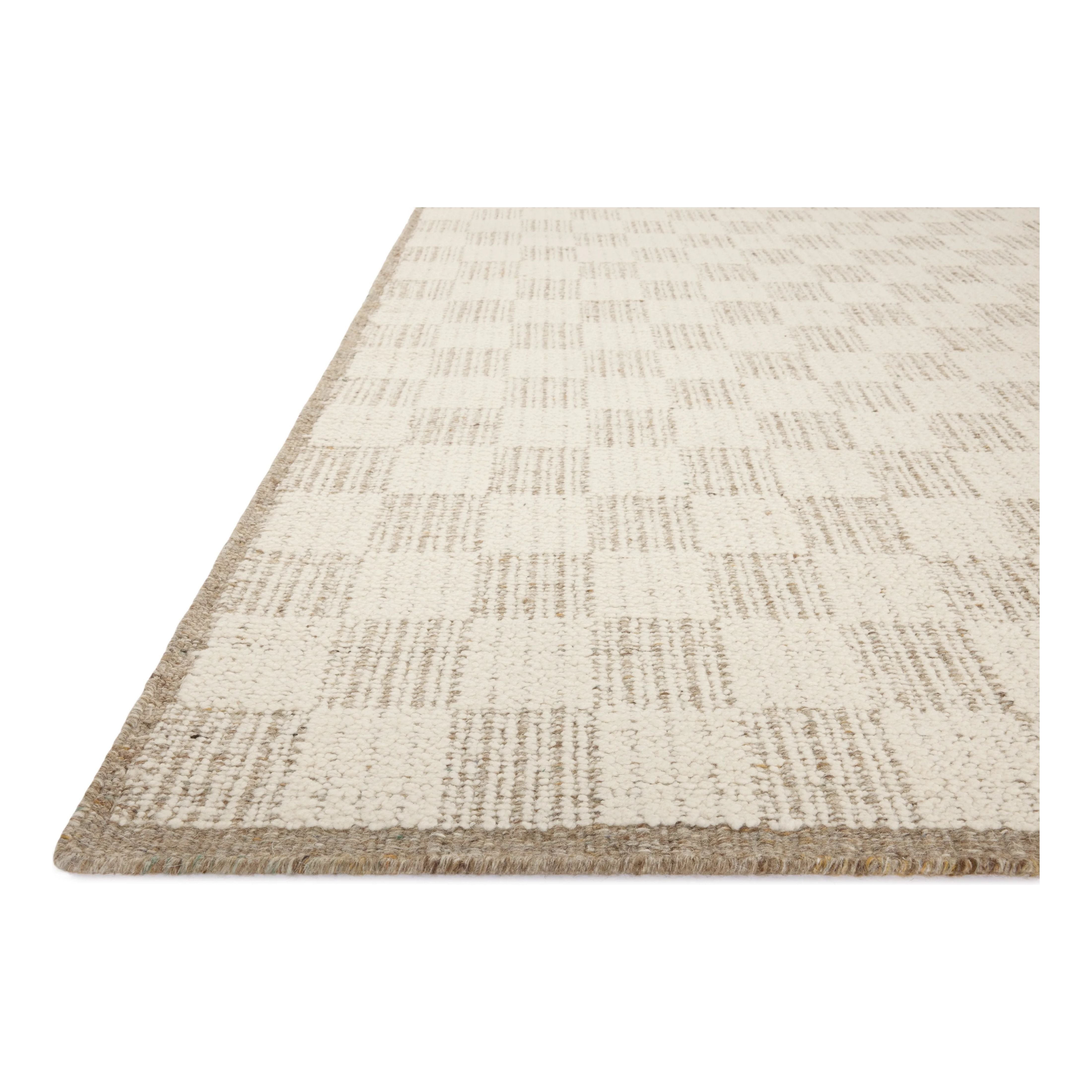 Featuring Brigette Romanek x Loloi Knox Ivory / Khaki Rug by Loloi at Amethyst Home. The Knox Ivory / Khaki Rug by Brigette Romanek x Loloi is a handwoven area rug with a contemporary checkerboard pattern and a texture reminiscent of a luxurious knit sweater. Made of a blend of wool and cotton that plays with scale and texture, Knox is imbued with cozy luxury t. Amethyst Home provides interior design, new home construction design consulting, vintage area rugs, and lighting in the Miami metro area.