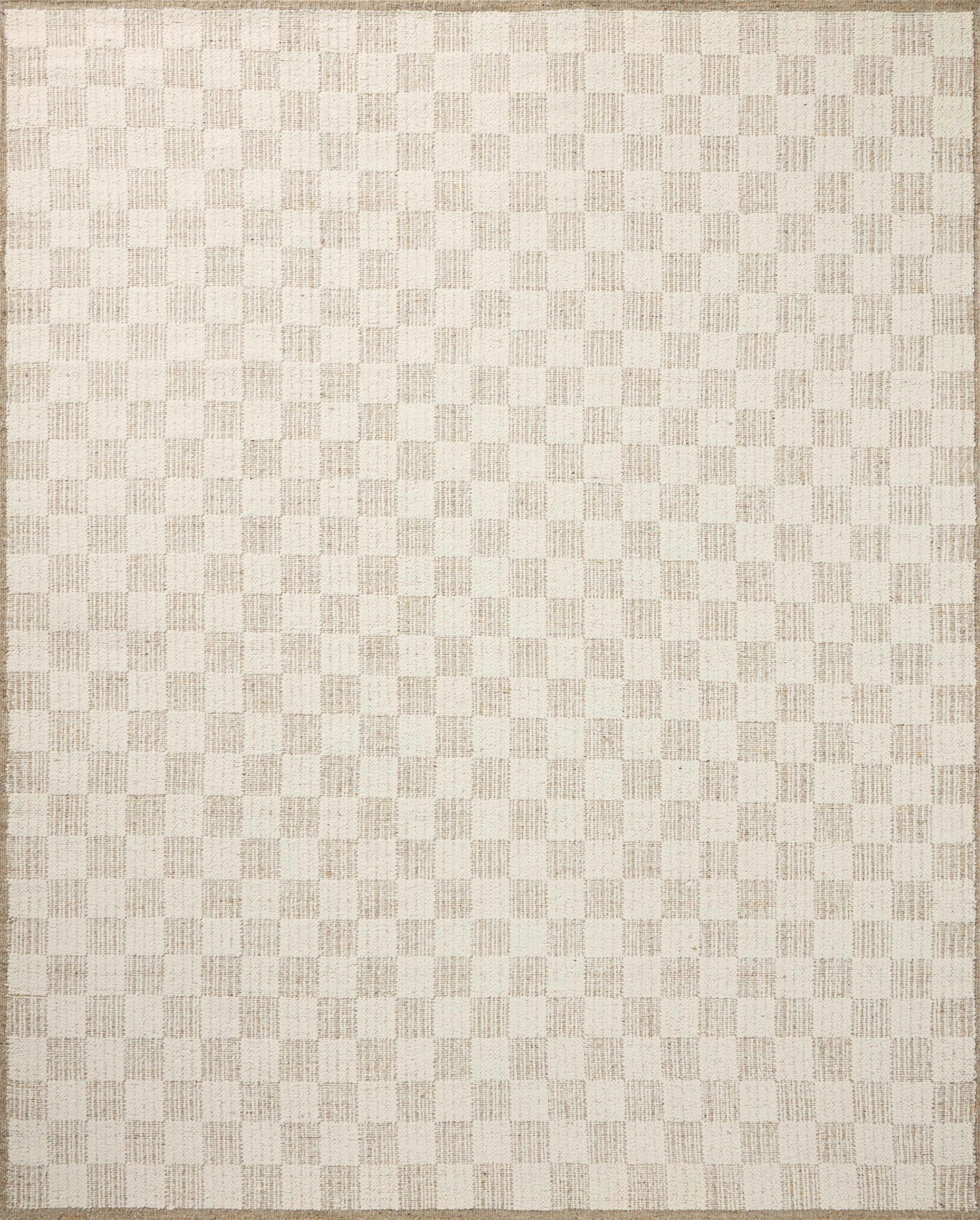 The Knox Ivory / Khaki Rug by Brigette Romanek x Loloi is a handwoven area rug with a contemporary checkerboard pattern and a texture reminiscent of a luxurious knit sweater. Made of a blend of wool and cotton that plays with scale and texture, Knox is imbued with cozy luxury that can anchor any room. Amethyst Home provides interior design, new home construction design consulting, vintage area rugs, and lighting in the Portland metro area.