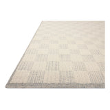 The Knox Ivory / Sky Rug by Brigette Romanek x Loloi is a handwoven area rug with a contemporary checkerboard pattern and a texture reminiscent of a luxurious knit sweater. Made of a blend of wool and cotton that plays with scale and texture, Knox is imbued with cozy luxury that can anchor any room. Amethyst Home provides interior design, new home construction design consulting, vintage area rugs, and lighting in the Omaha metro area.
