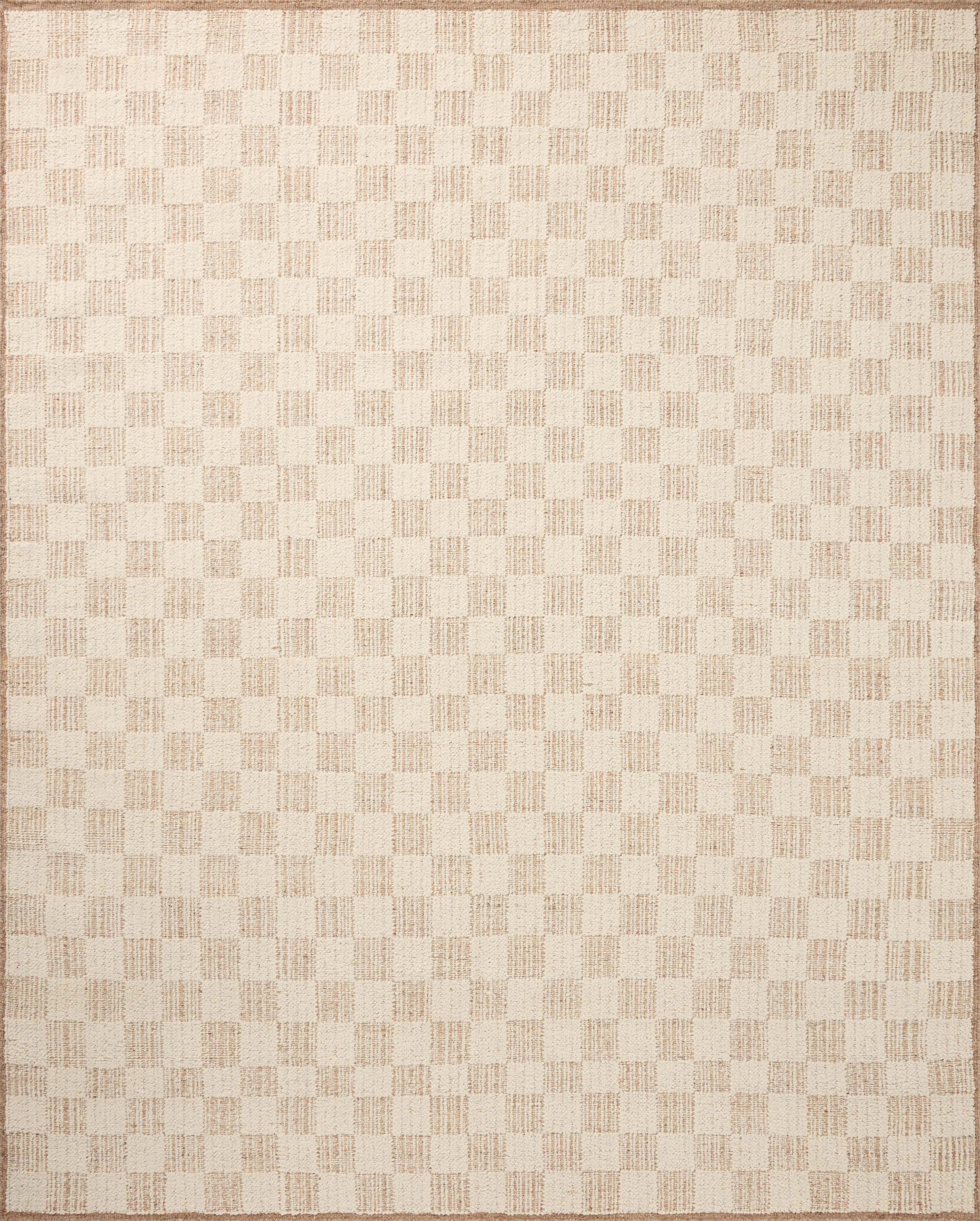 The Knox Ivory / Terracotta Rug by Brigette Romanek x Loloi is a handwoven area rug with a contemporary checkerboard pattern and a texture reminiscent of a luxurious knit sweater. Made of a blend of wool and cotton that plays with scale and texture, Knox is imbued with cozy luxury that can anchor any room. Amethyst Home provides interior design, new home construction design consulting, vintage area rugs, and lighting in the Alpharetta metro area.