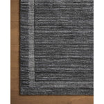 Irresistible to walk upon, the Dana Ink Rug by Brigette Romanek x Loloi has a high-low texture that alternates between a subtly shaggy pile and a soft base. Horizontal broken stripes give the area rug a fresh and energized structure, while a finish of fringe along the edges accentuates its sense of movement. Amethyst Home provides interior design, new home construction design consulting, vintage area rugs, and lighting in the Des Moines metro area.
