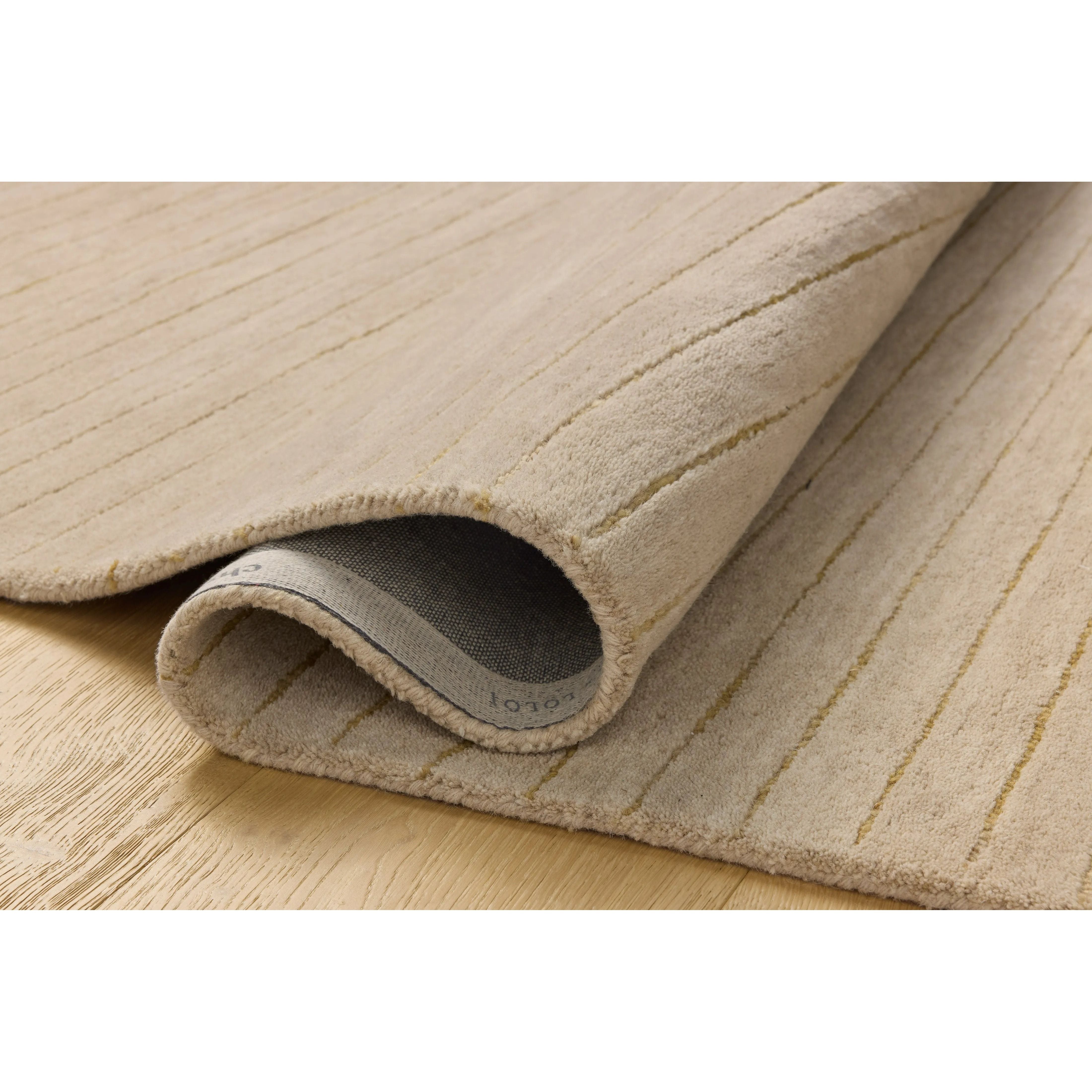 Featuring Chris Loves Julia × Loloi Henry Beige / Wheat Rug by Loloi at Amethyst Home. The Henry Collection from Chris Loves Julia x Loloi is a hand-tufted area rug that adds a touch of personality to a solid-colored design that can easily pair with other patterns in the room. These designs feature tufted stripes for subtle contrast and depth. The rugs woo. Amethyst Home provides interior design, new home construction design consulting, vintage area rugs, and lighting in the Washington metro area.