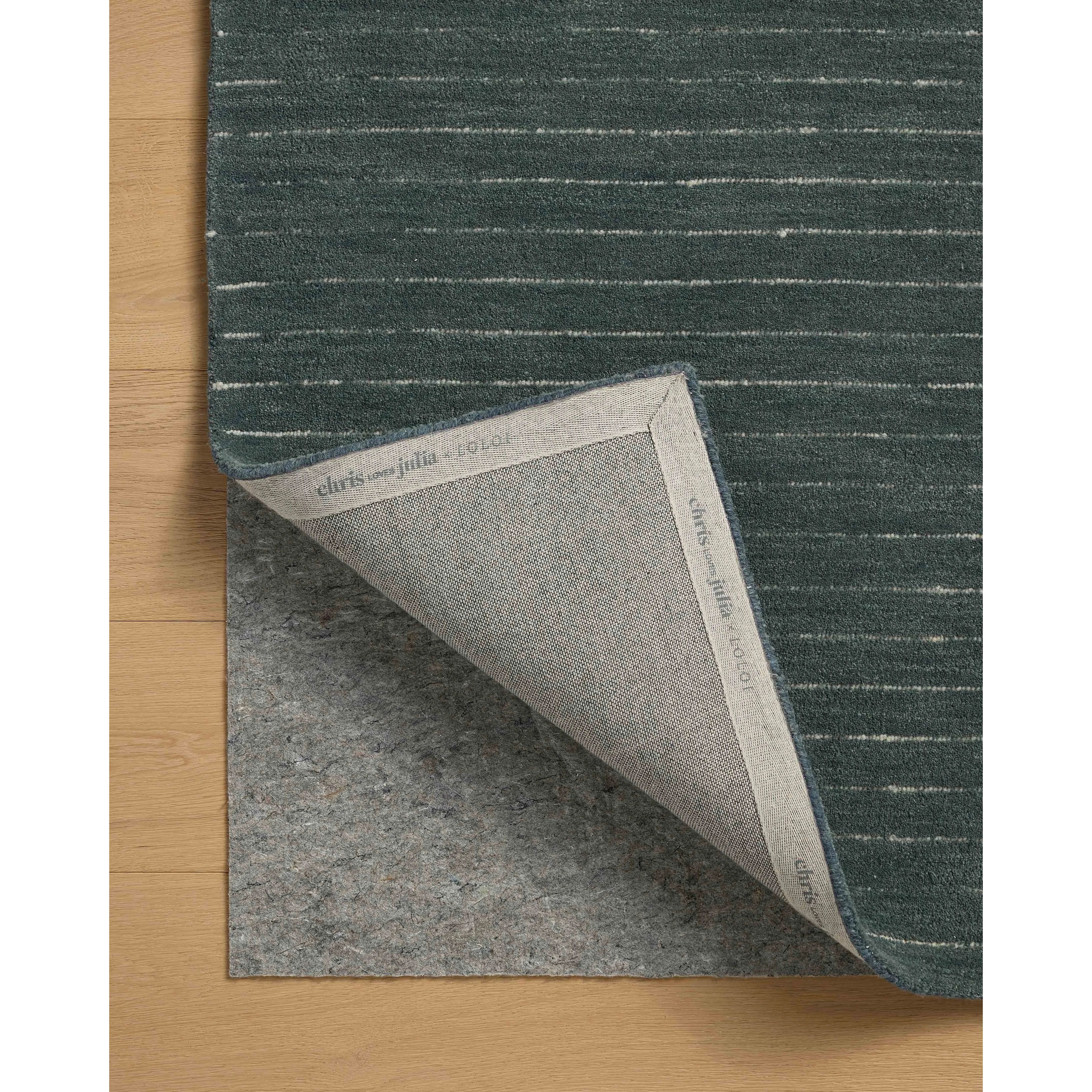 Featuring Chris Loves Julia × Loloi Henry Denim / Ivory Rug by Loloi at Amethyst Home. The Henry Collection from Chris Loves Julia x Loloi is a hand-tufted area rug that adds a touch of personality to a solid-colored design that can easily pair with other patterns in the room. These designs feature tufted stripes for subtle contrast and depth. The rugs woo. Amethyst Home provides interior design, new home construction design consulting, vintage area rugs, and lighting in the Alpharetta metro area.