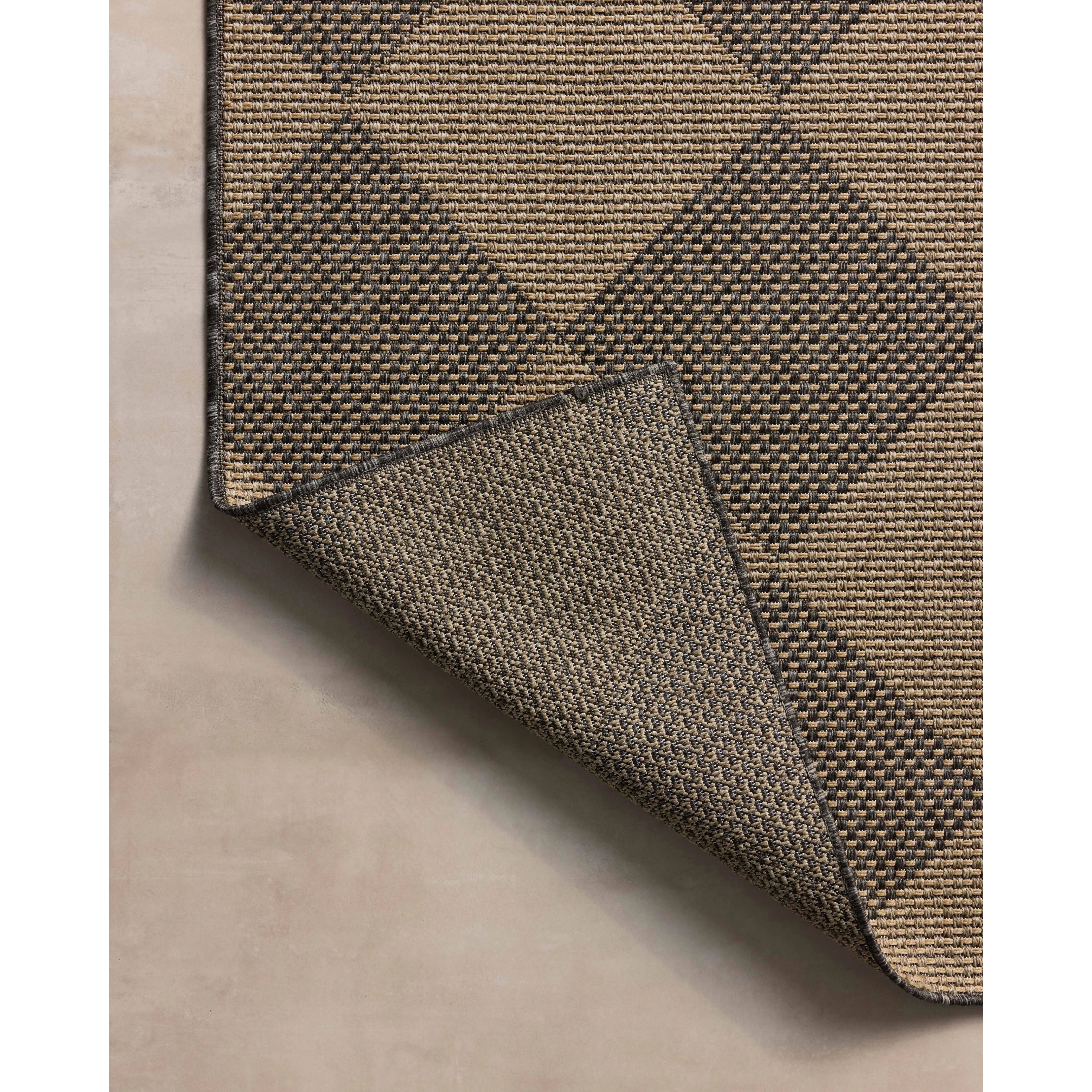 Featuring Chris Loves Julia × Loloi Providence Graphite / Sand Rug by Loloi at Amethyst Home. The Providence Collection is an indoor/outdoor rug with a woven-style design by Chris Loves Julia x Loloi. Providence is made of extra durable power-loomed polyester for versatile styling in patios, mudrooms, dining rooms, hallways, or more. It has an earth-toned, org. Amethyst Home provides interior design, new home construction design consulting, vintage area rugs, and lighting in the Austin metro area.