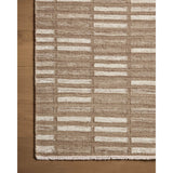 The Harvey Collection is a hand-woven flatweave area rug with a modern tile design and short, fringed edges. The rug's low pile has a casual feel, refined by the varying tones of the geometric design that can fit into living rooms, dining rooms, bedrooms, and more. Amethyst Home provides interior design, new home construction design consulting, vintage area rugs, and lighting in the Alpharetta metro area.