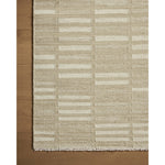 The Harvey Collection is a hand-woven flatweave area rug with a modern tile design and short, fringed edges. The rug's low pile has a casual feel, refined by the varying tones of the geometric design that can fit into living rooms, dining rooms, bedrooms, and more. Amethyst Home provides interior design, new home construction design consulting, vintage area rugs, and lighting in the Park City metro area.