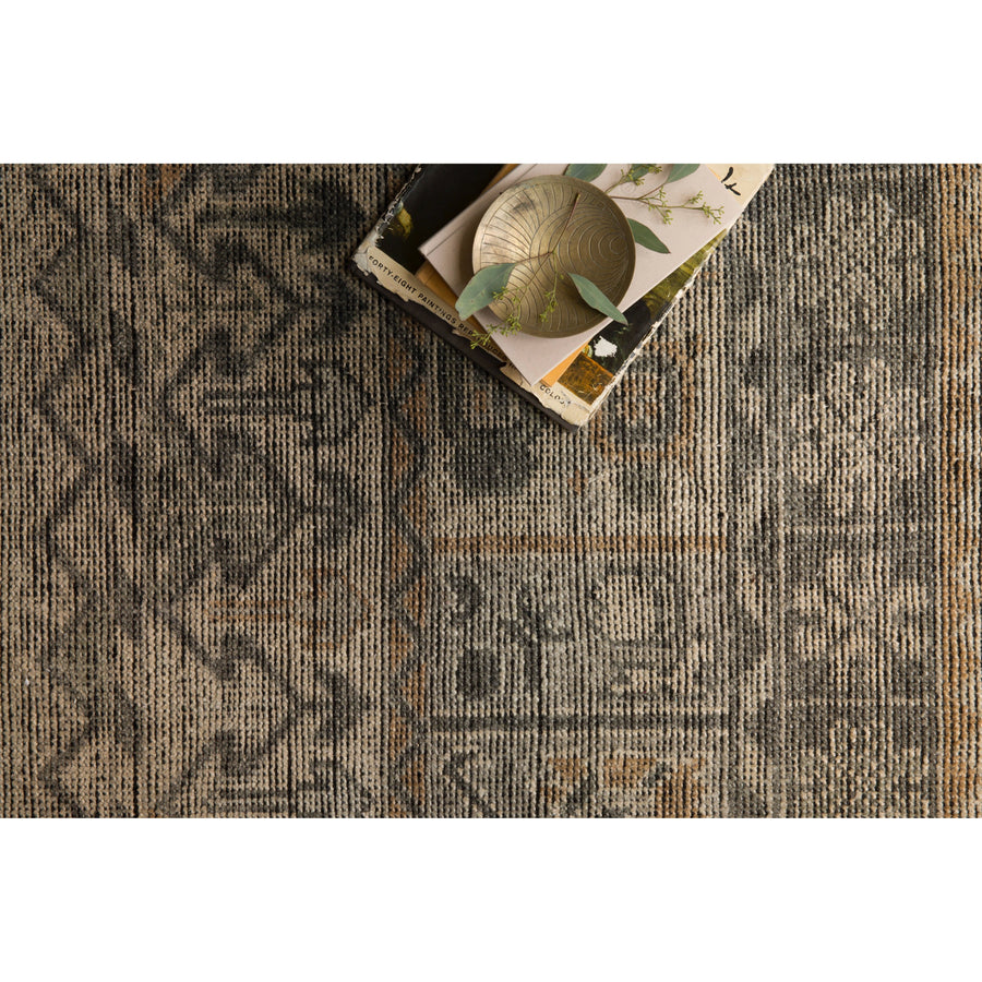 Bring a touch of antiqued beauty into your home with the Heirloom Bone / Charcoal HQ-06 rug from Loloi. This wool rug tastefully honors the art of hand knotted rugs. This rug would be perfect for a living room, dining room, bedroom, hallway or kitchen runner with it's patterns and calming tones for your home. Amethyst Home provides interior design, new construction, custom furniture, and rugs for the Orlando, Winter Garden, Tampa, and Winter Park, Florida metro area.