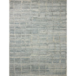 The Hughes Collection is a chunky and soft hand-knotted area rug with a graphic pattern for elevated home decor. The design comes to life with a space-dyed pile that reveals a multitude of beautiful tones, perfect for living rooms, bedrooms, and more high-traffic areas. Amethyst Home provides interior design, new home construction design consulting, vintage area rugs, and lighting in the Miami metro area.