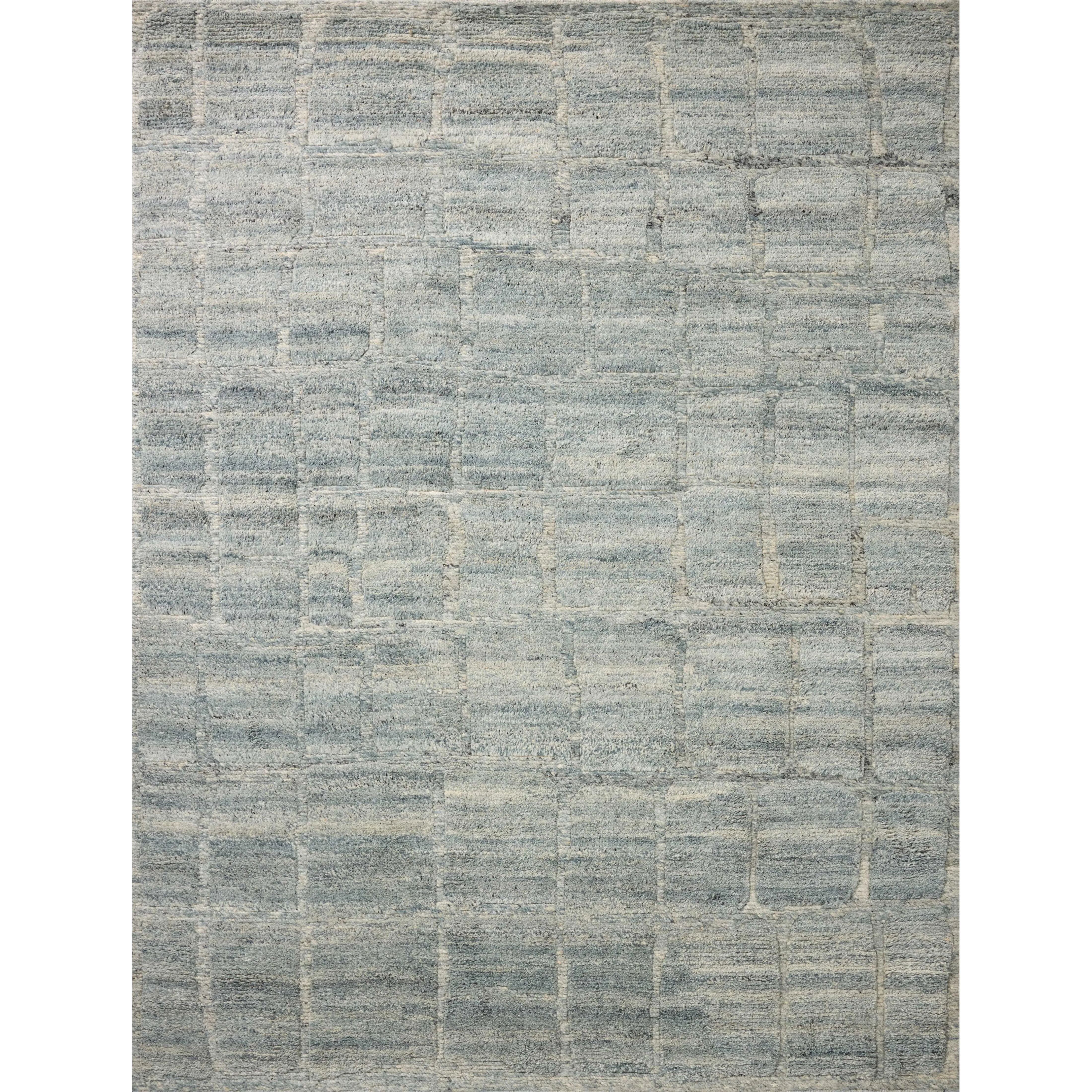 The Hughes Collection is a chunky and soft hand-knotted area rug with a graphic pattern for elevated home decor. The design comes to life with a space-dyed pile that reveals a multitude of beautiful tones, perfect for living rooms, bedrooms, and more high-traffic areas. Amethyst Home provides interior design, new home construction design consulting, vintage area rugs, and lighting in the Miami metro area.