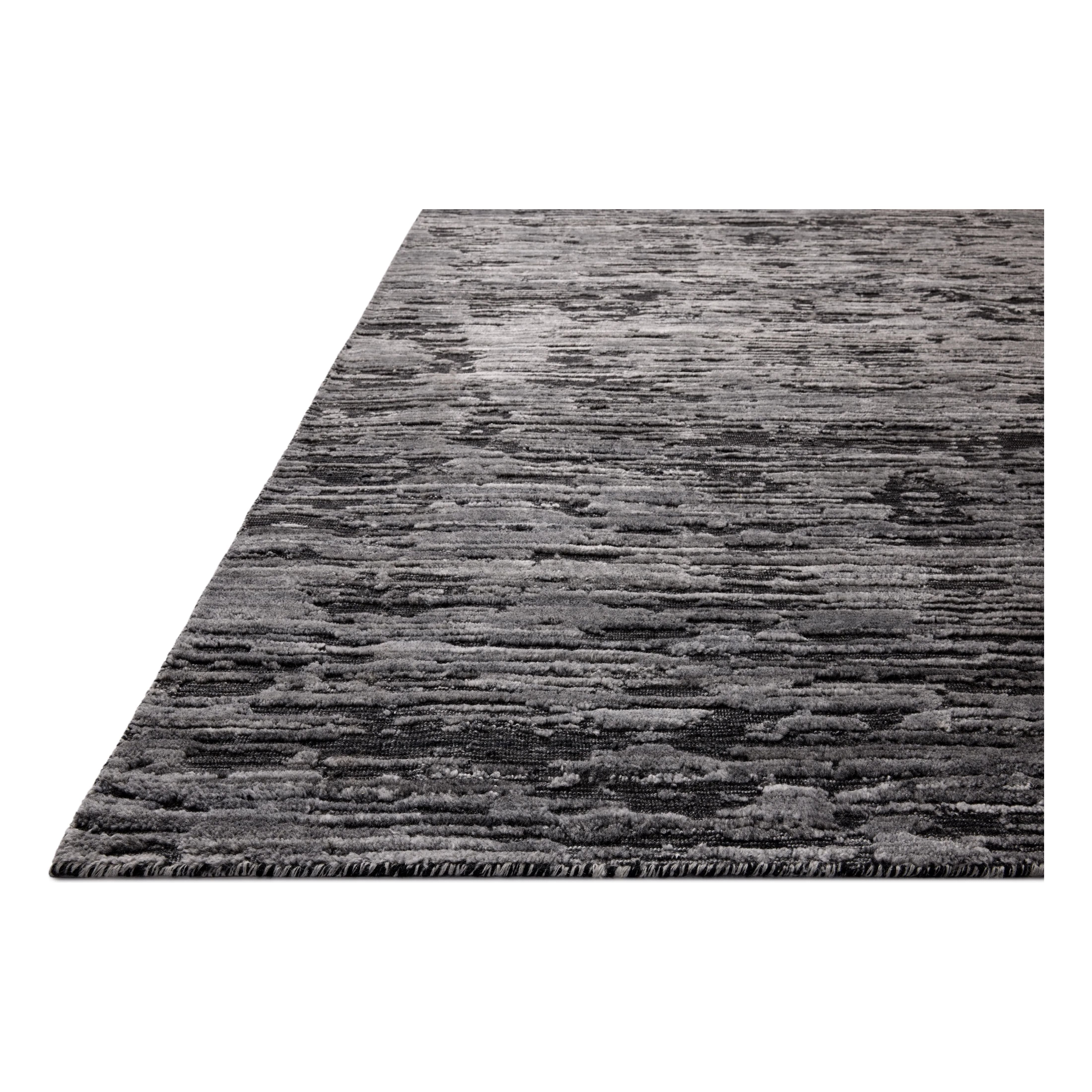 Featuring Jean Stoffer x Loloi Daniel Charcoal Rug by Loloi at Amethyst Home. Area rugs in the Daniel Charcoal Rug have a graphic design in a range of tonal palettes with a soft, gently ribbed texture. The hand-loomed pile is a blend of bamboo and wool with a slight sheen that captures the light and changes the rug’s sense of depth throughout the day. The D. Amethyst Home provides interior design, new home construction design consulting, vintage area rugs, and lighting in the Nashville metro area.