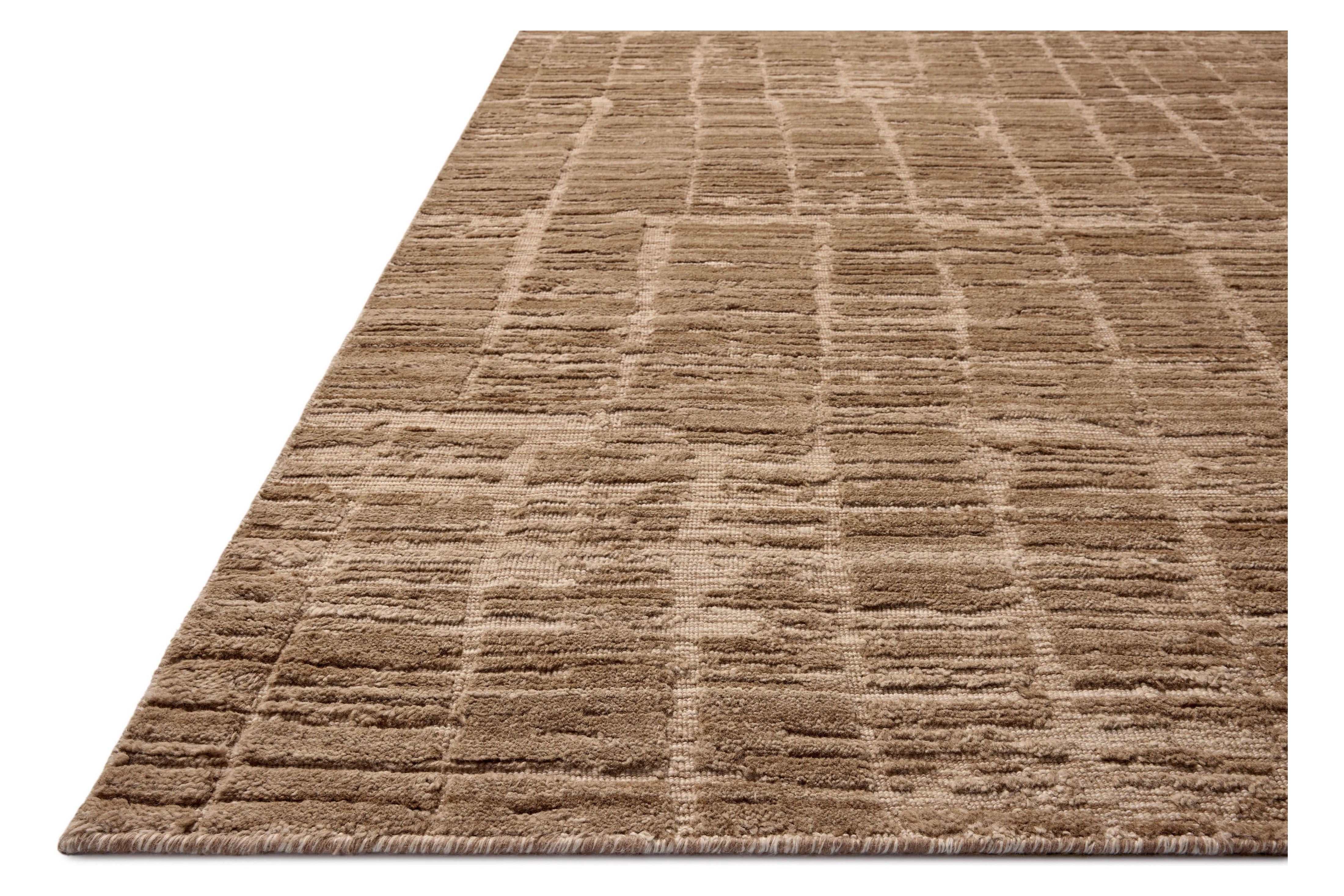 Area rugs in the Daniel Fawn Rug have a graphic design in a range of tonal palettes with a soft, gently ribbed texture. The hand-loomed pile is a blend of bamboo and wool with a slight sheen that captures the light and changes the rug’s sense of depth throughout the day. Amethyst Home provides interior design, new home construction design consulting, vintage area rugs, and lighting in the Salt Lake City metro area.