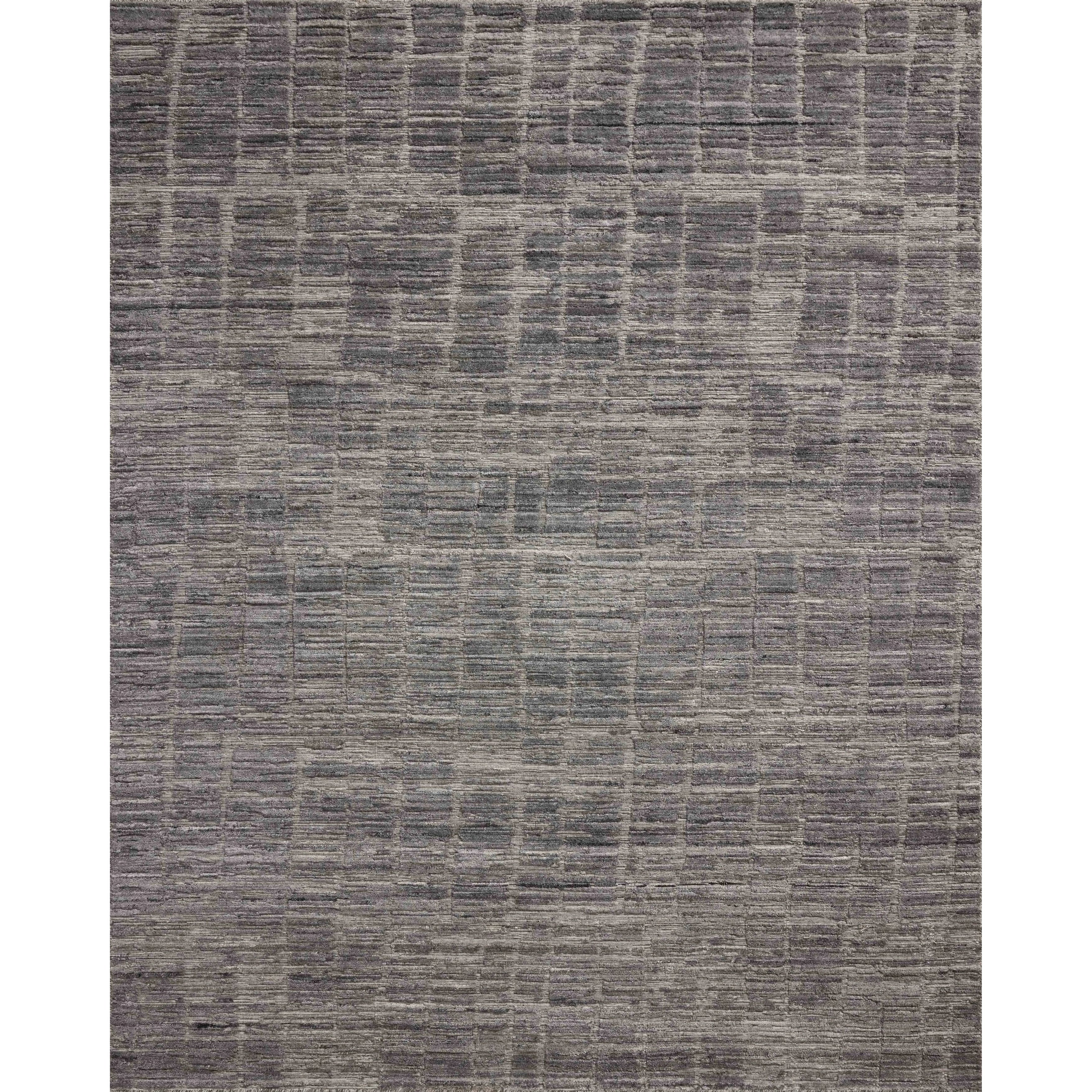 Area rugs in the Daniel Slate Rug have a graphic design in a range of tonal palettes with a soft, gently ribbed texture. The hand-loomed pile is a blend of bamboo and wool with a slight sheen that captures the light and changes the rug’s sense of depth throughout the day. Amethyst Home provides interior design, new home construction design consulting, vintage area rugs, and lighting in the Park City metro area.