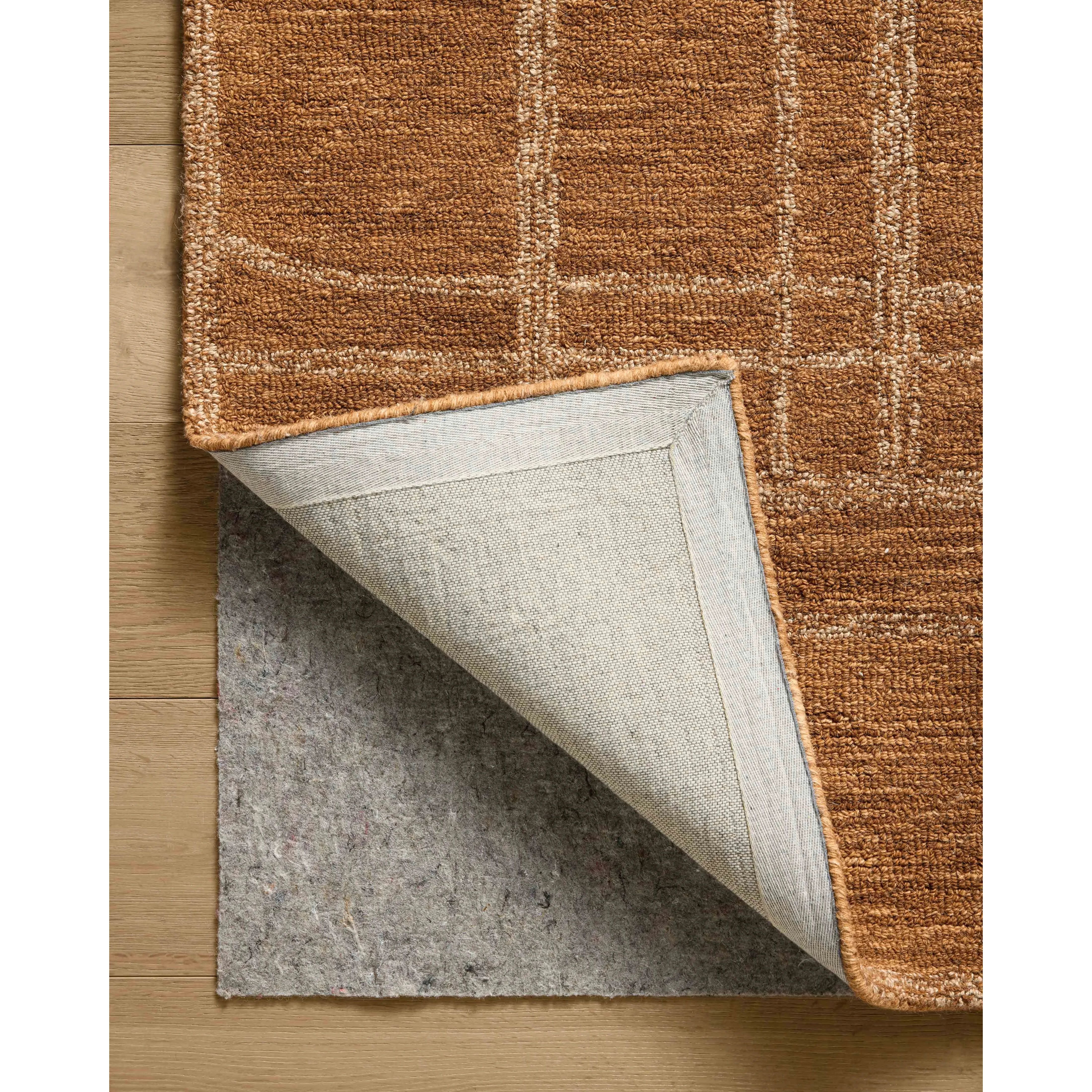 The Barrow Collection by Jeremiah Brent x Loloi is a hand-tufted area rug with a bold linear design inspired by modern art and classical architecture. The rug’s pile is a blend of wool and jute for a stable, substantial feel that can ground living rooms, dining rooms, bedrooms, and more. Amethyst Home provides interior design, new home construction design consulting, vintage area rugs, and lighting in the Calabasas metro area.