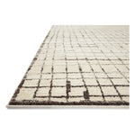 Featuring Jeremiah Brent x Loloi Bleecker Ivory / Charcoal Rug by Loloi at Amethyst Home. The Bleecker Collection by Jeremiah Brent x Loloi is a soft, power-loomed rug in warm colorways that change in different lighting. With high-contrast linear patterns and careful distressing, Bleecker represents Jeremiah love of modern design. This collection is mad. Amethyst Home provides interior design, new home construction design consulting, vintage area rugs, and lighting in the Newport Beach metro area.